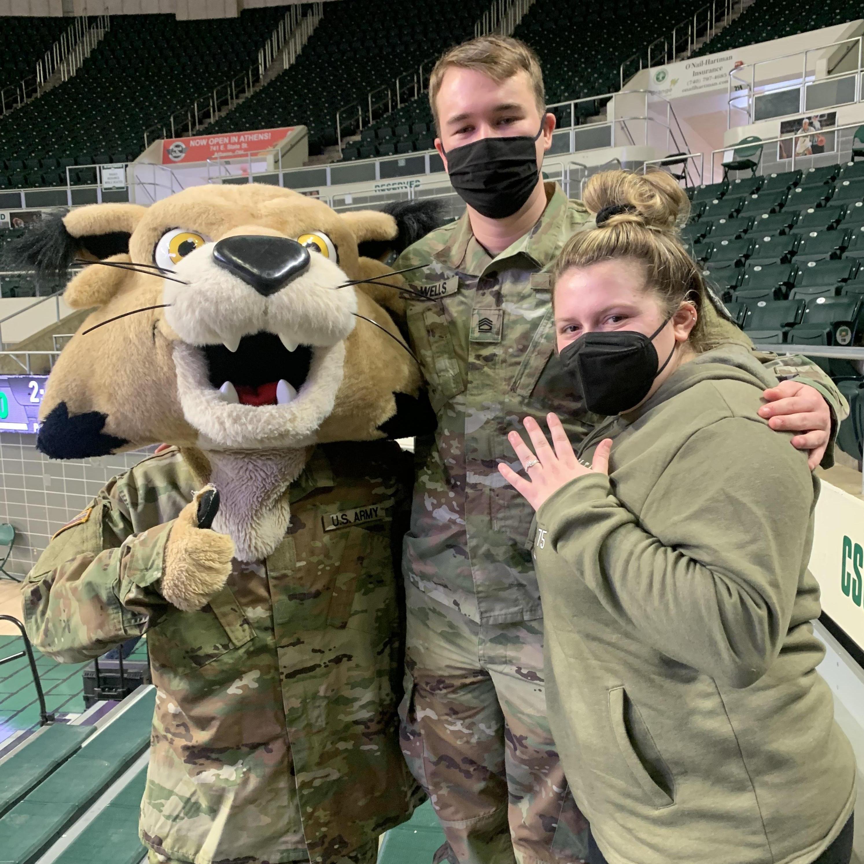 A picture with Rufus right after Conner proposed to Jackie at the Military Appreciation Wrestling Meet in the Convocation Center!