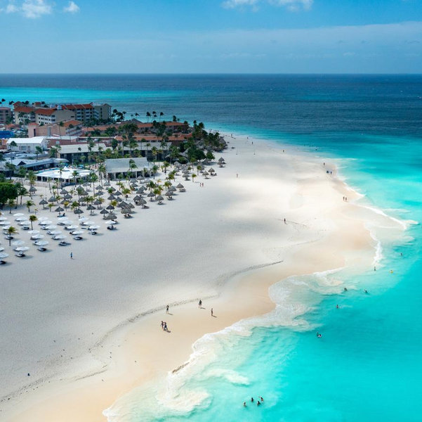 Beach chair & umbrella for the day in Aruba