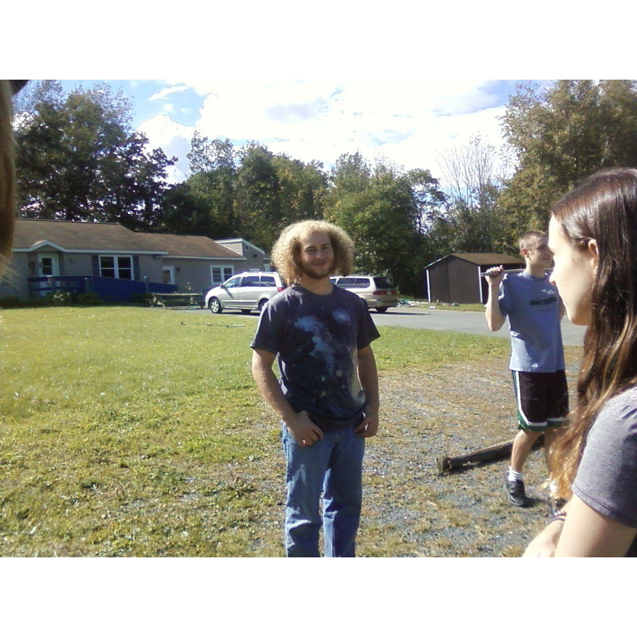 The first picture Baraq ever let me take of him, during homeschool archery club a couple of months before we admitted we liked each other.