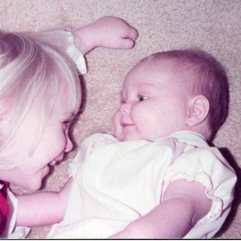 Emily (pictured with sister, Amy)