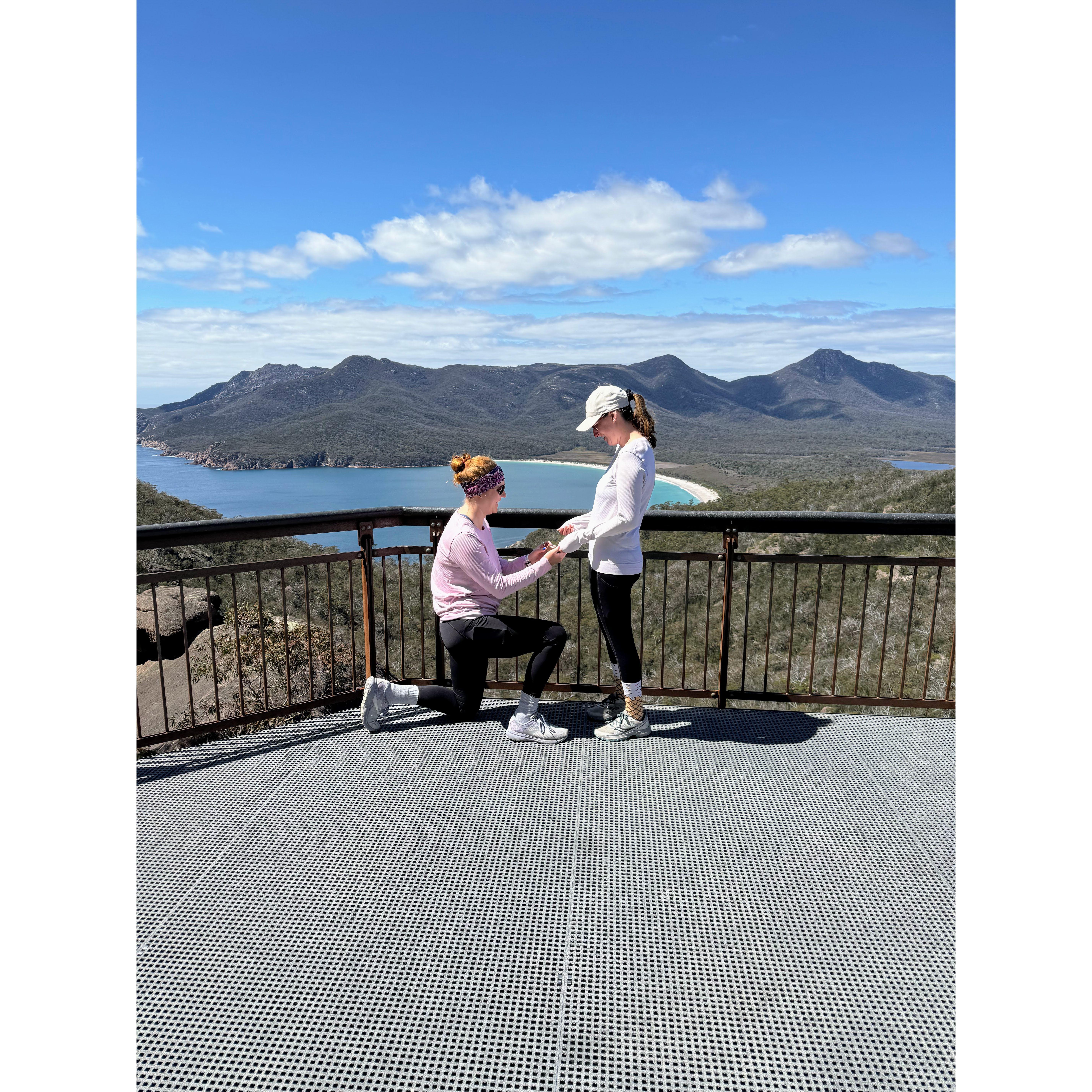 On 12/18/24, Caroline’s sister Jessica flew from the UK to help with a secret mission. After a tough climb up Wineglass Bay’s steps in Tasmania, Caroline asked Shana to marry her - and she said yes!
