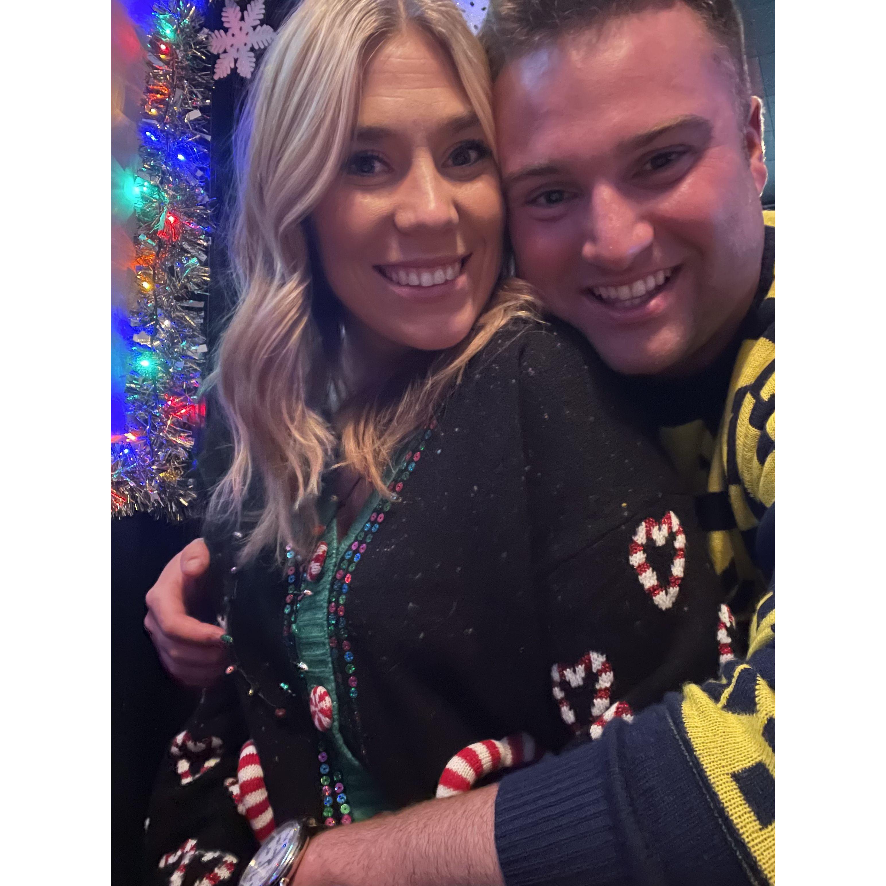 Watching the Big 10 Championship game at the Ugly Christmas Sweater Bar Crawl where we first met.