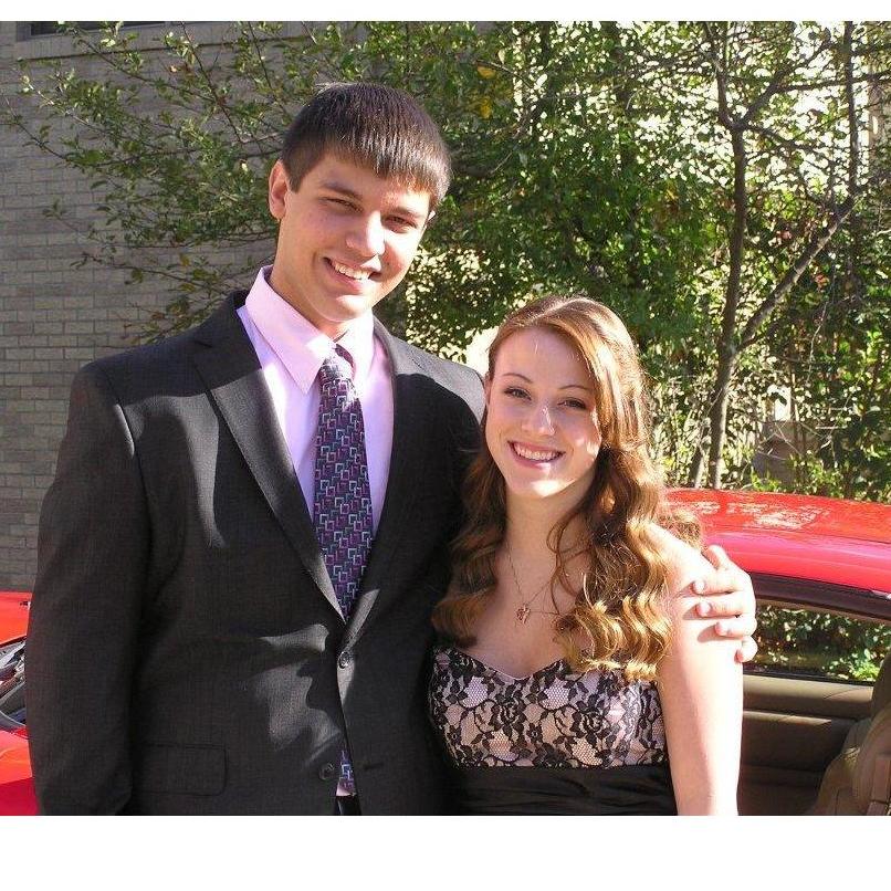 Our senior year homecoming, where Nick's step-dad let us take his sports car to drive us and our friends!