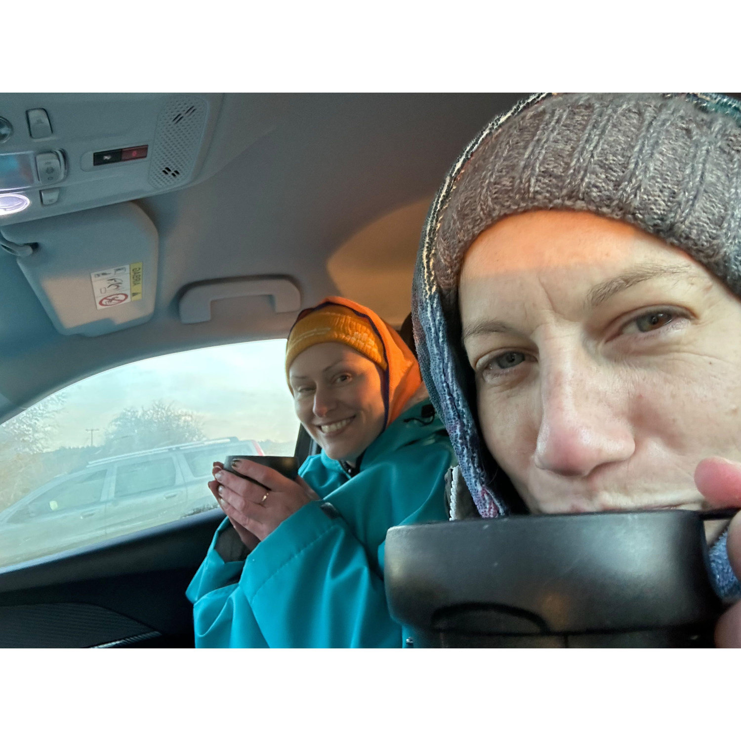 After our swim in the car warming up with hot tea.