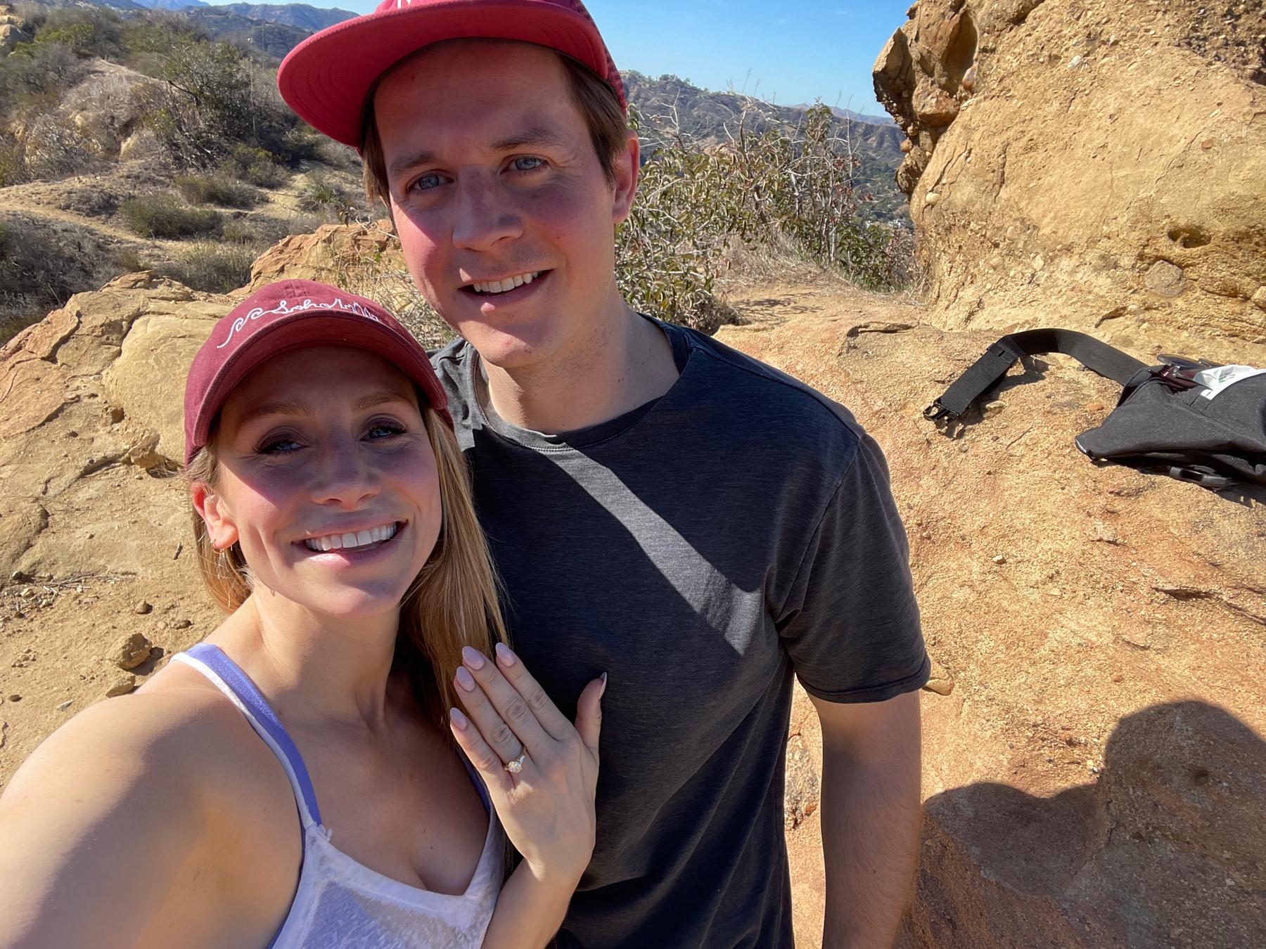 Michael proposed to Lindsay on a hike in Malibu on November 13, 2021.