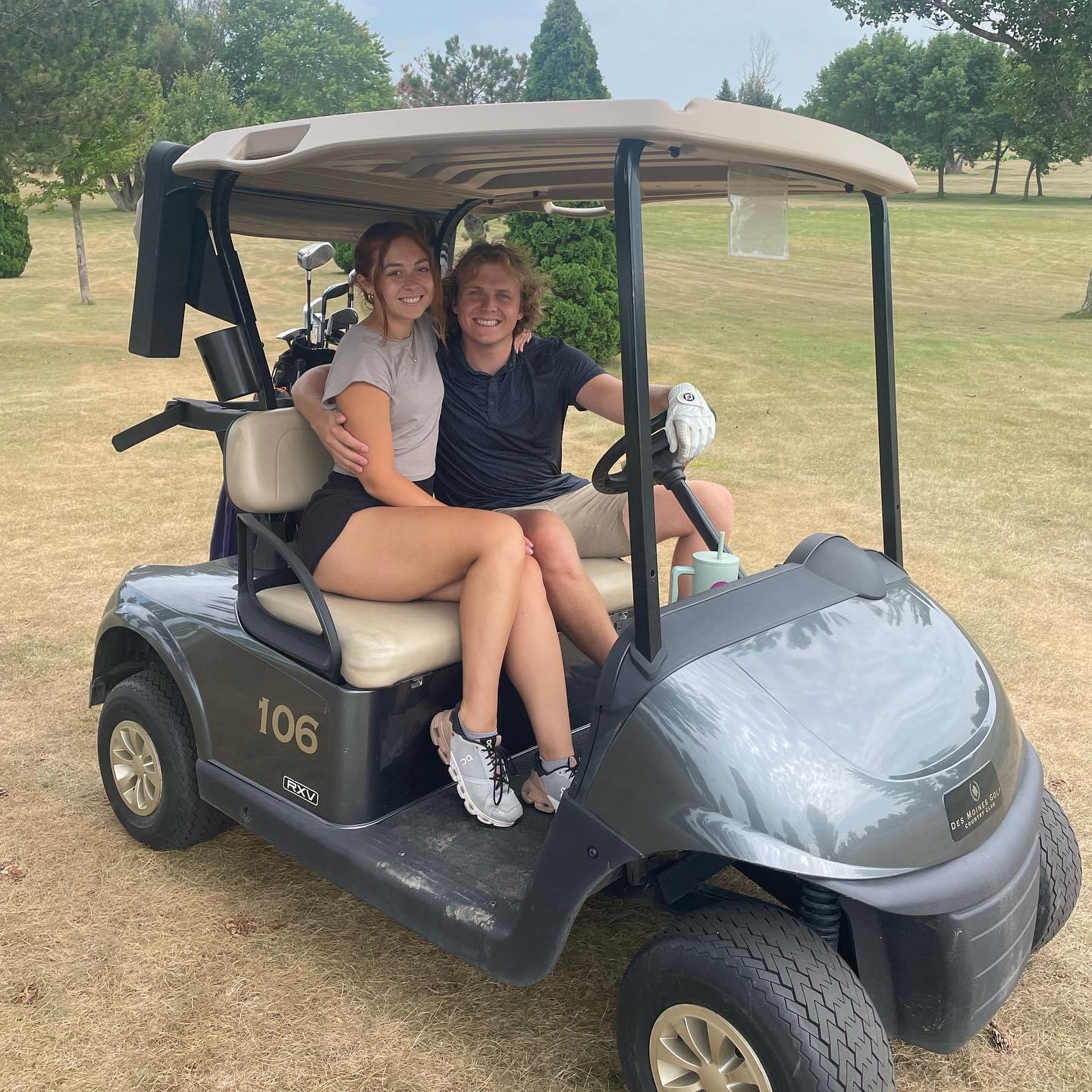 Luke and his golf caddie