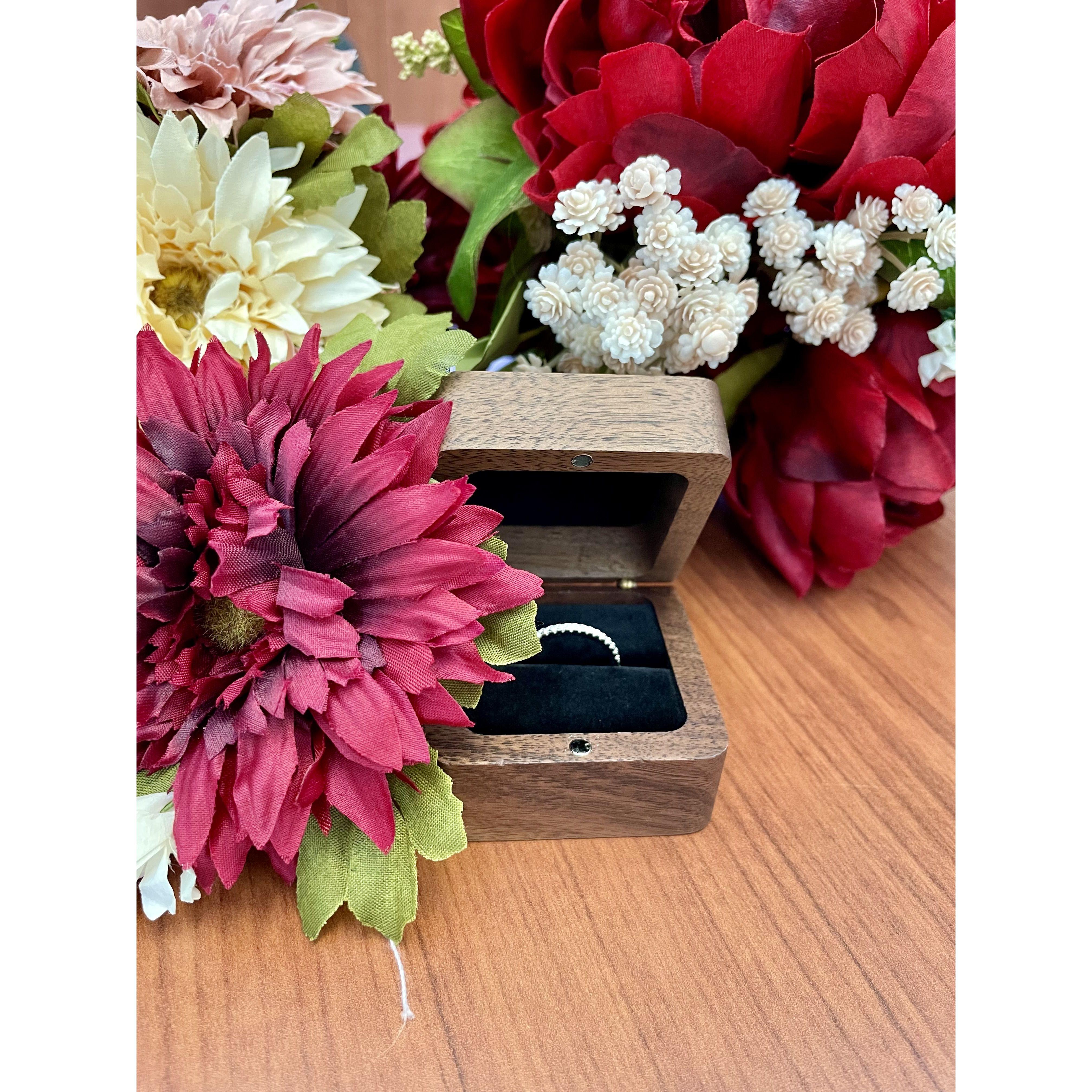 Sarah's ring and handmade bouquet and boutonniere before the ceremony.