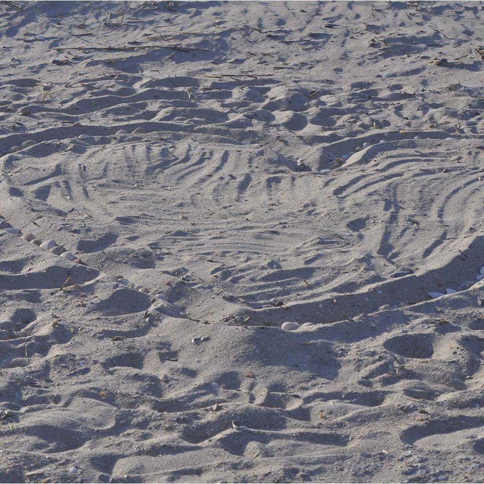 The heart in the sand made by our Bridesmaid Krystle Beal setting the stage for Steven's big question!