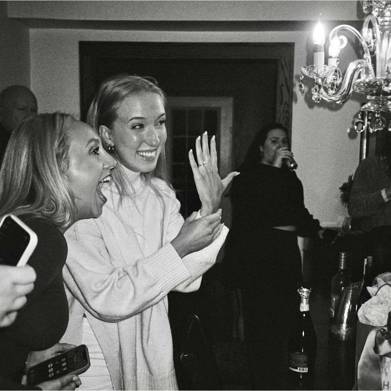 Immediately after the proposal, Tommy surprised me with a party with all of our friends and family.