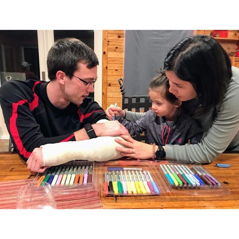 After Zach broke his radius in Colorado Springs, Julia and Zach headed to Texas to spend Christmas with the Ahrns and Stovall families. Of course, Lena (Julia's niece) needed to sign his cast!