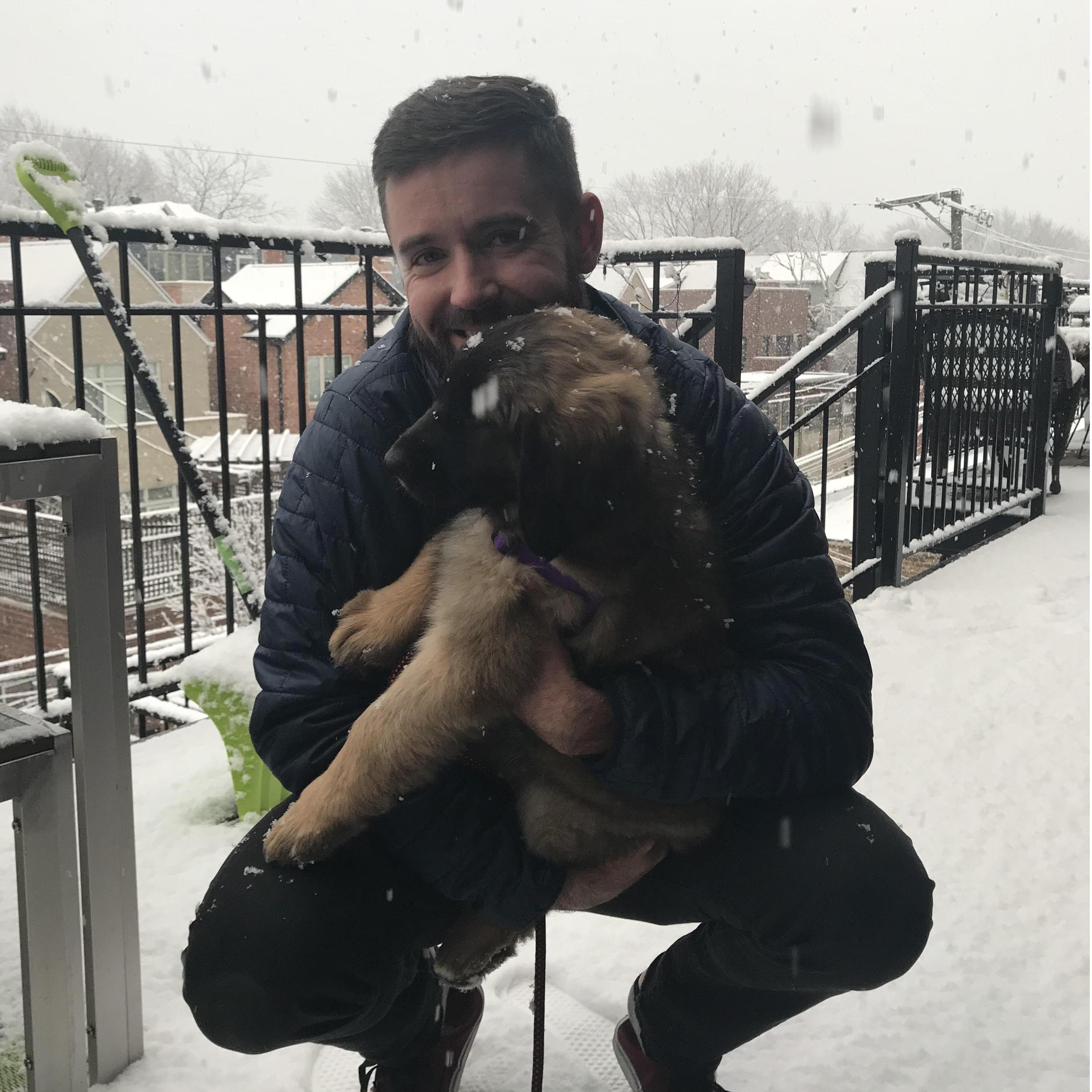 He only pretends to look happy schlepping her up three flights...