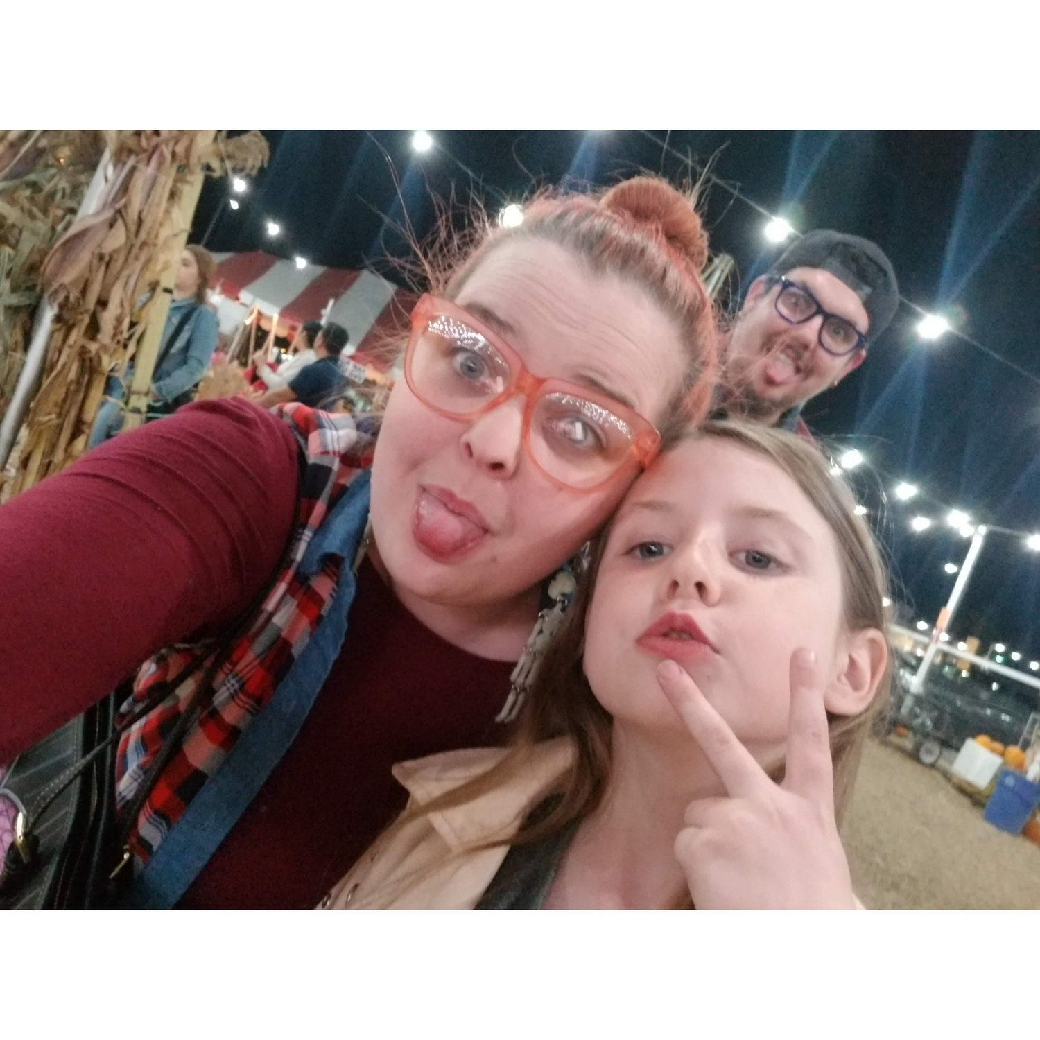 one of our first Octobers together in a pumpkin patch . our favorite time of year