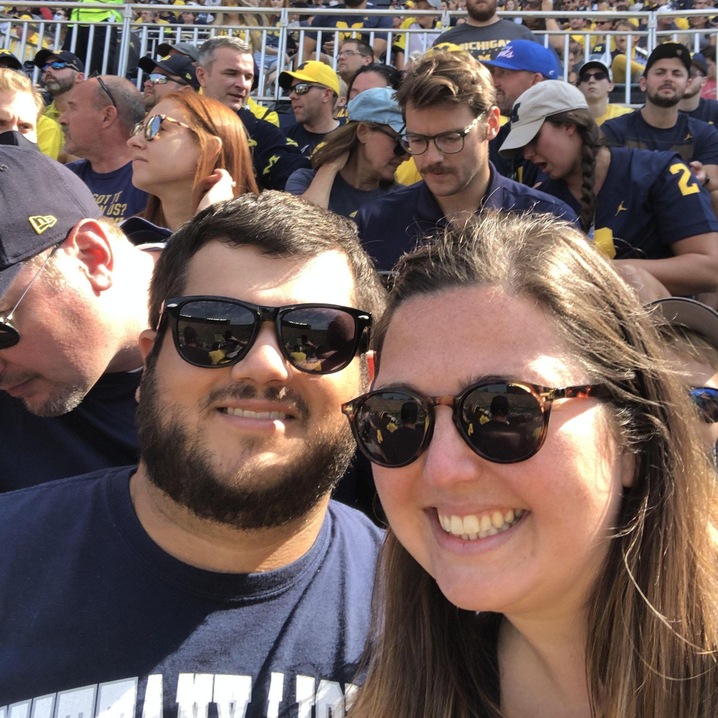 First photo together! Chris was brave enough to go to the Big House in a Penn State shirt