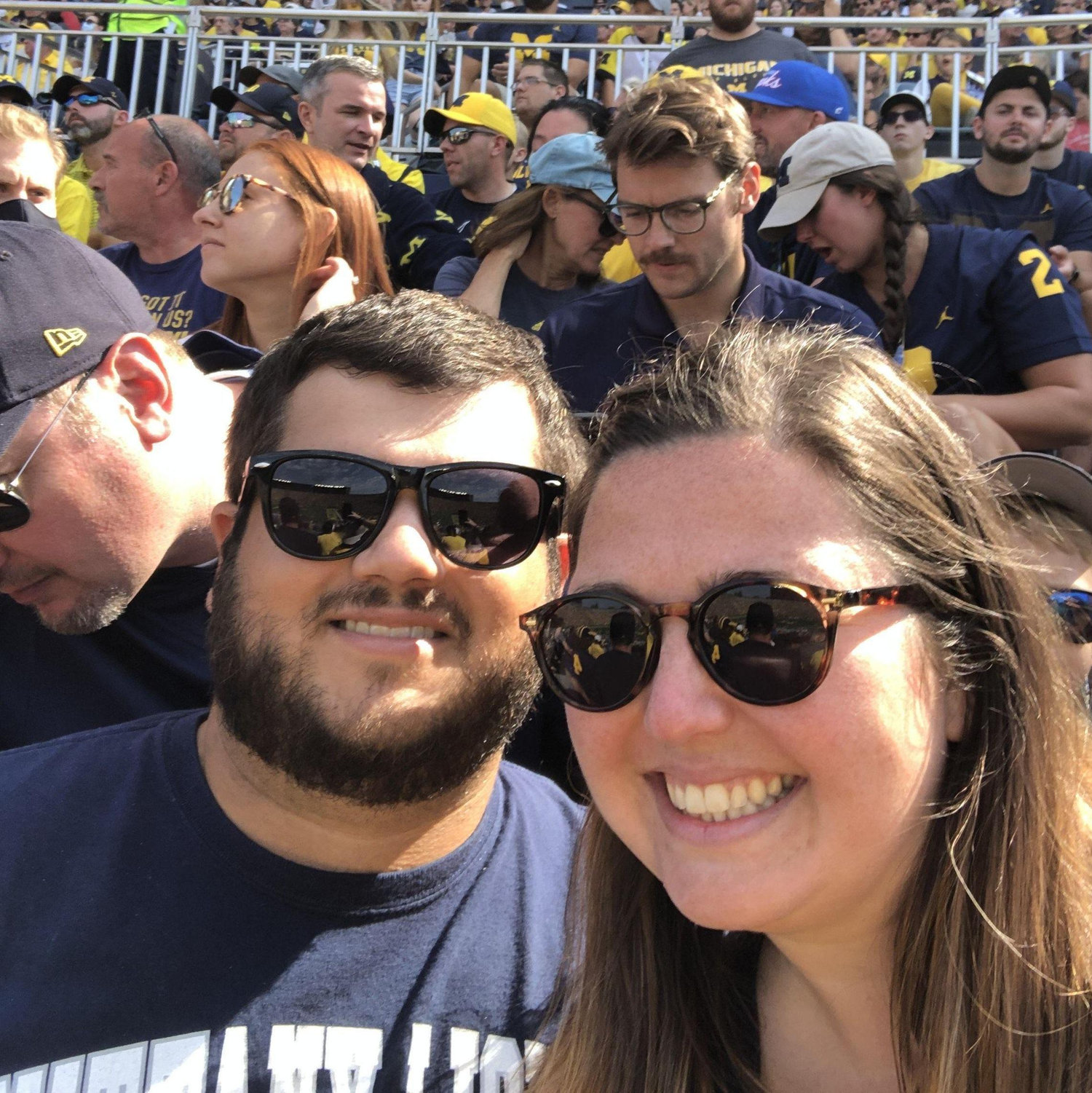 First photo together! Chris was brave enough to go to the Big House in a Penn State shirt