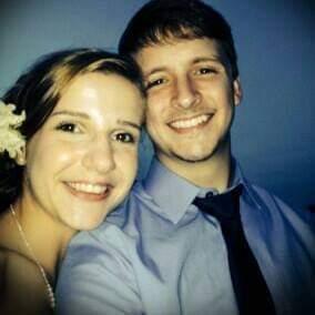 August 2014 at Lisa's big sister's wedding reception... Collin tucked those flowers behind Lisa's ear right before this picture was taken.