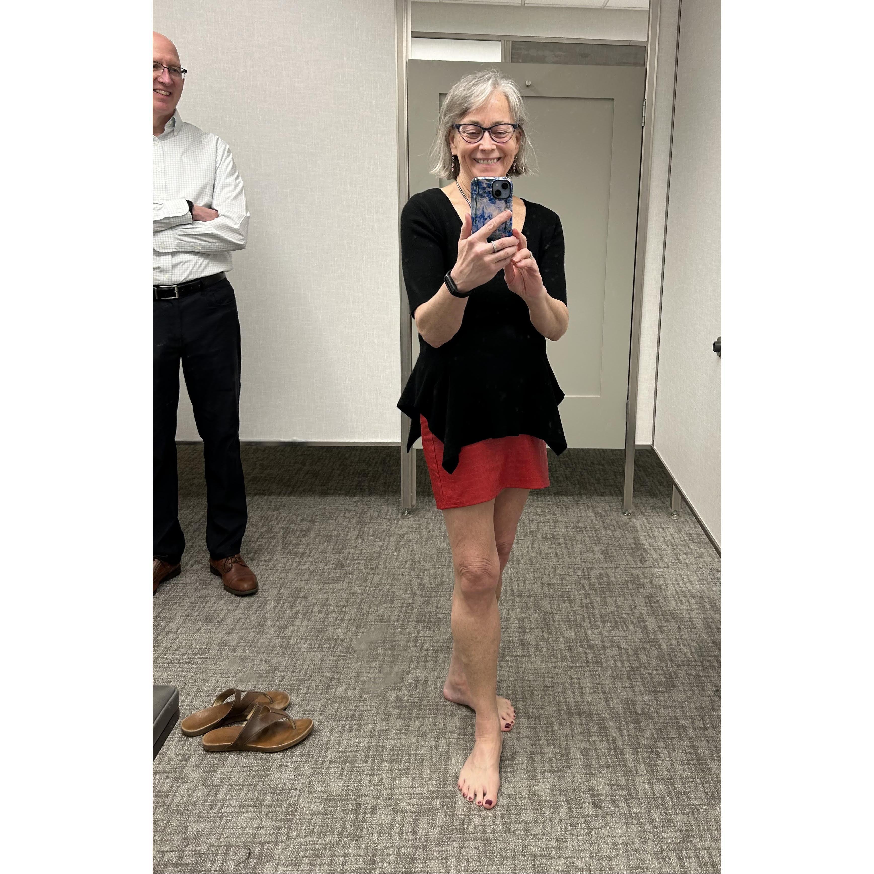 Trying on a red leather miniskirt in a fancy Miami mall!