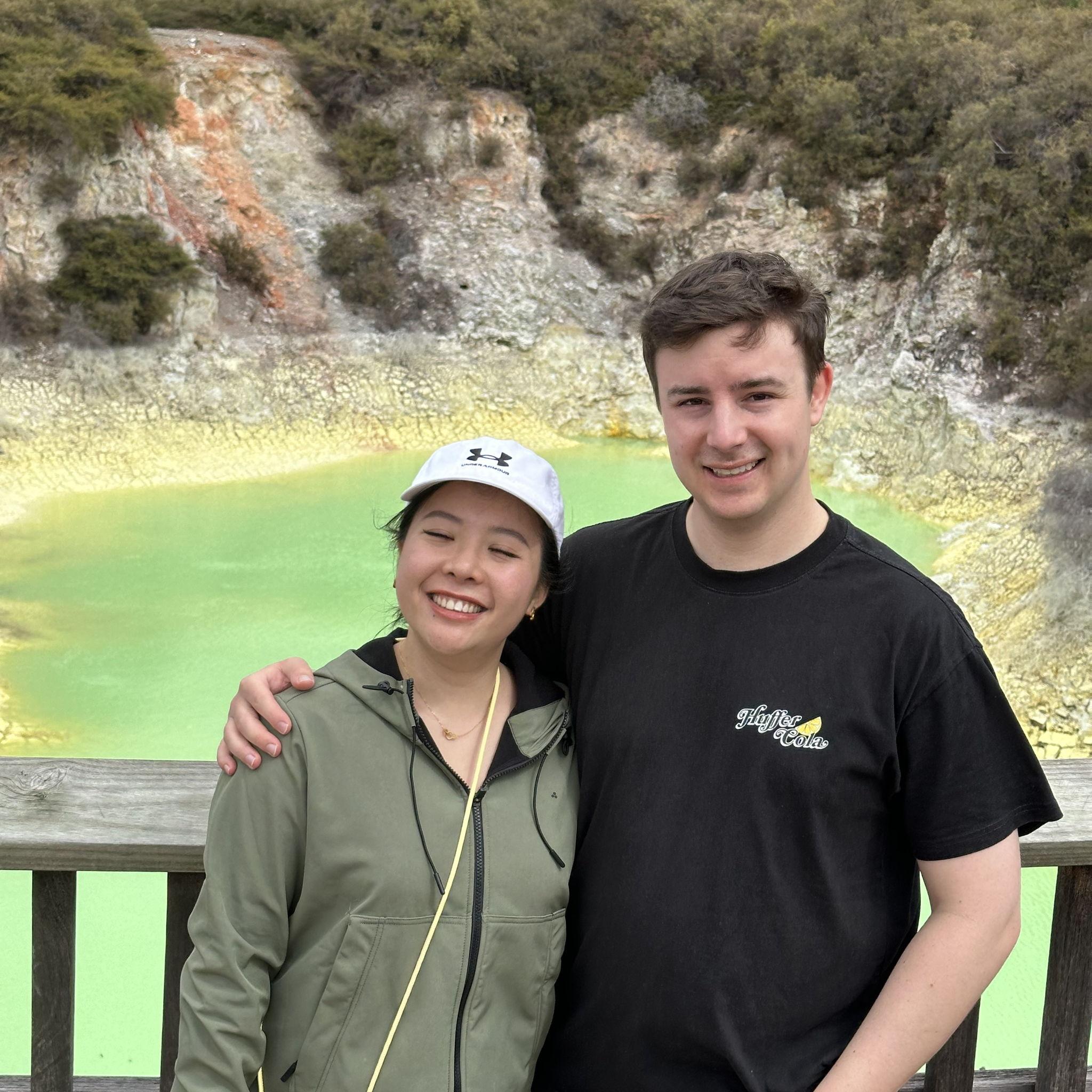 September 2025, Wai-O-Tapu Thermal Wonderland, Rotorua - Don't fall in! Surely Lucia's eye can't be closed in every photo... well none that Andrew looks good in. Oh well here it is!