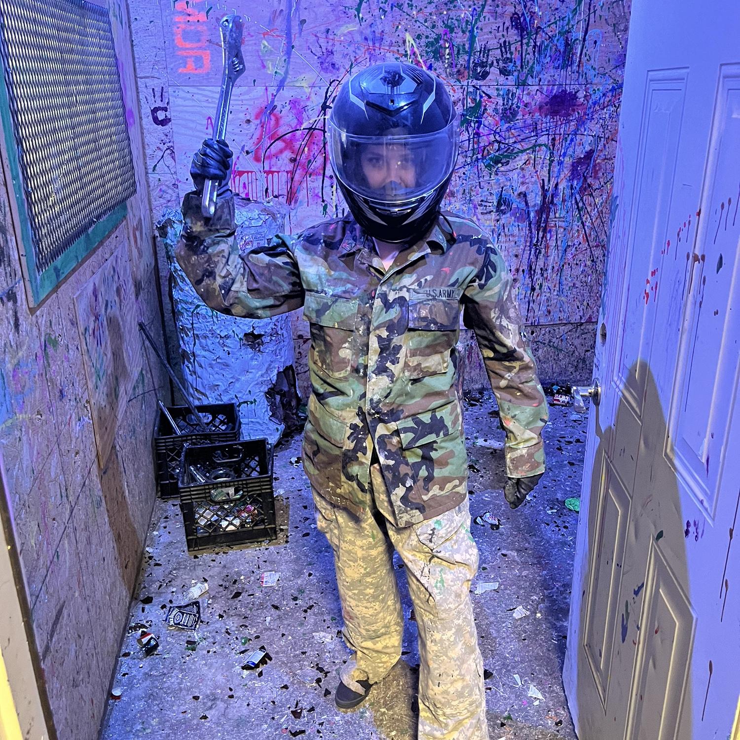 Ani tearing shit up in the rage room at the axe house
