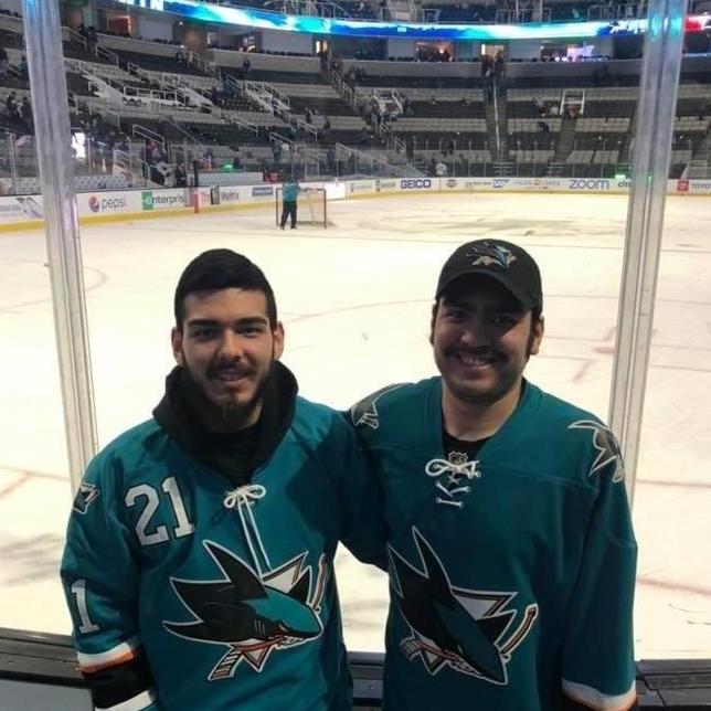 Matt and Johnathan at a San Jose Sharks Game