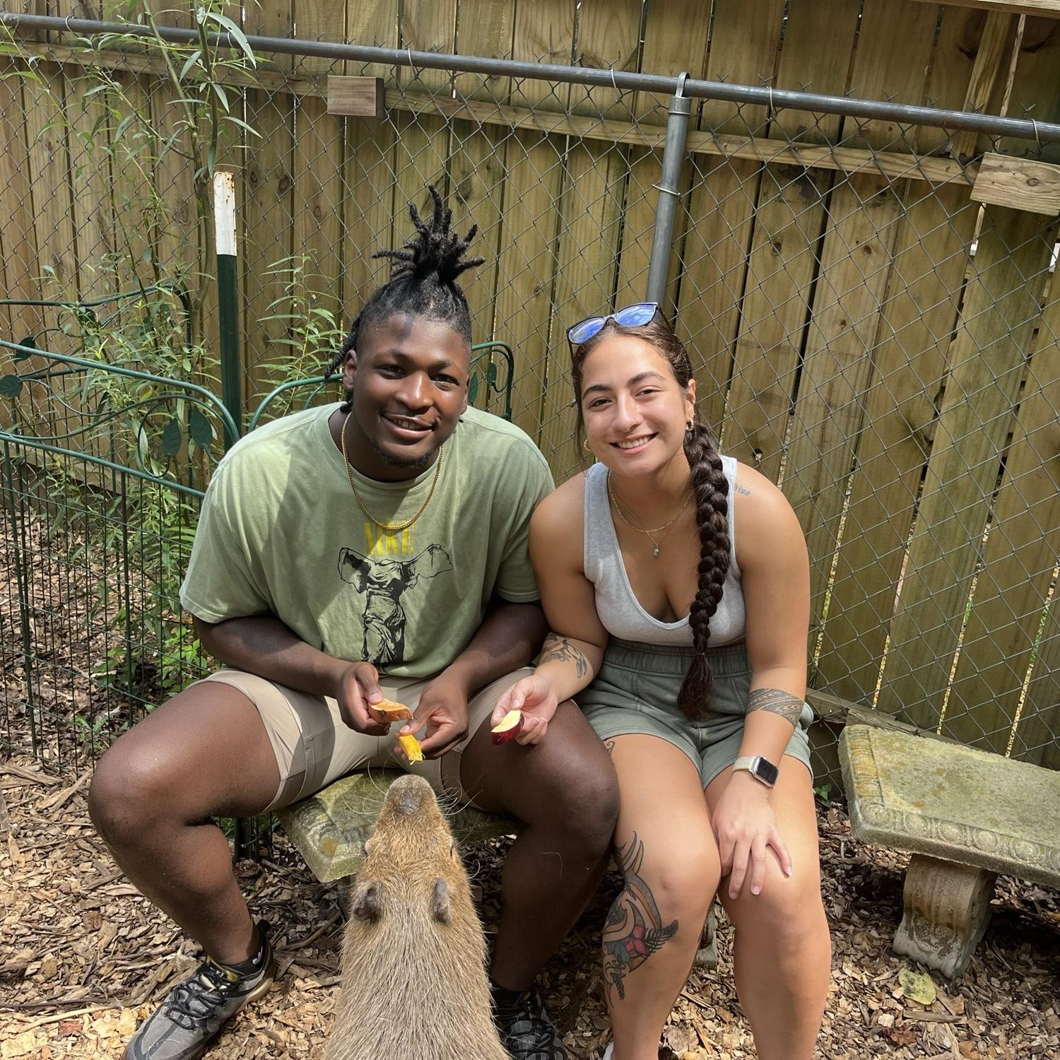 Petting Capybaras in Dahlonega, GA for our 4-year anniversary!