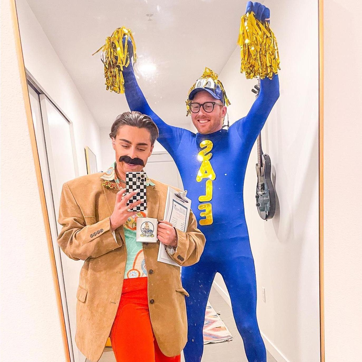 October 2022: Our favorite Halloween Costumes, a slimely car salesman and a car lot windsock man.