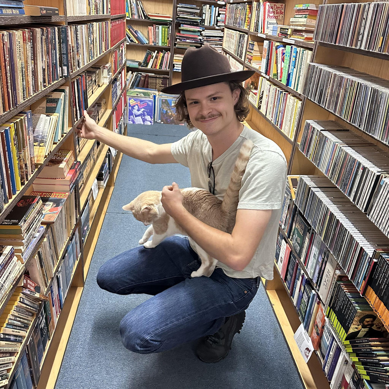 Always in a bookstore, always making friends.