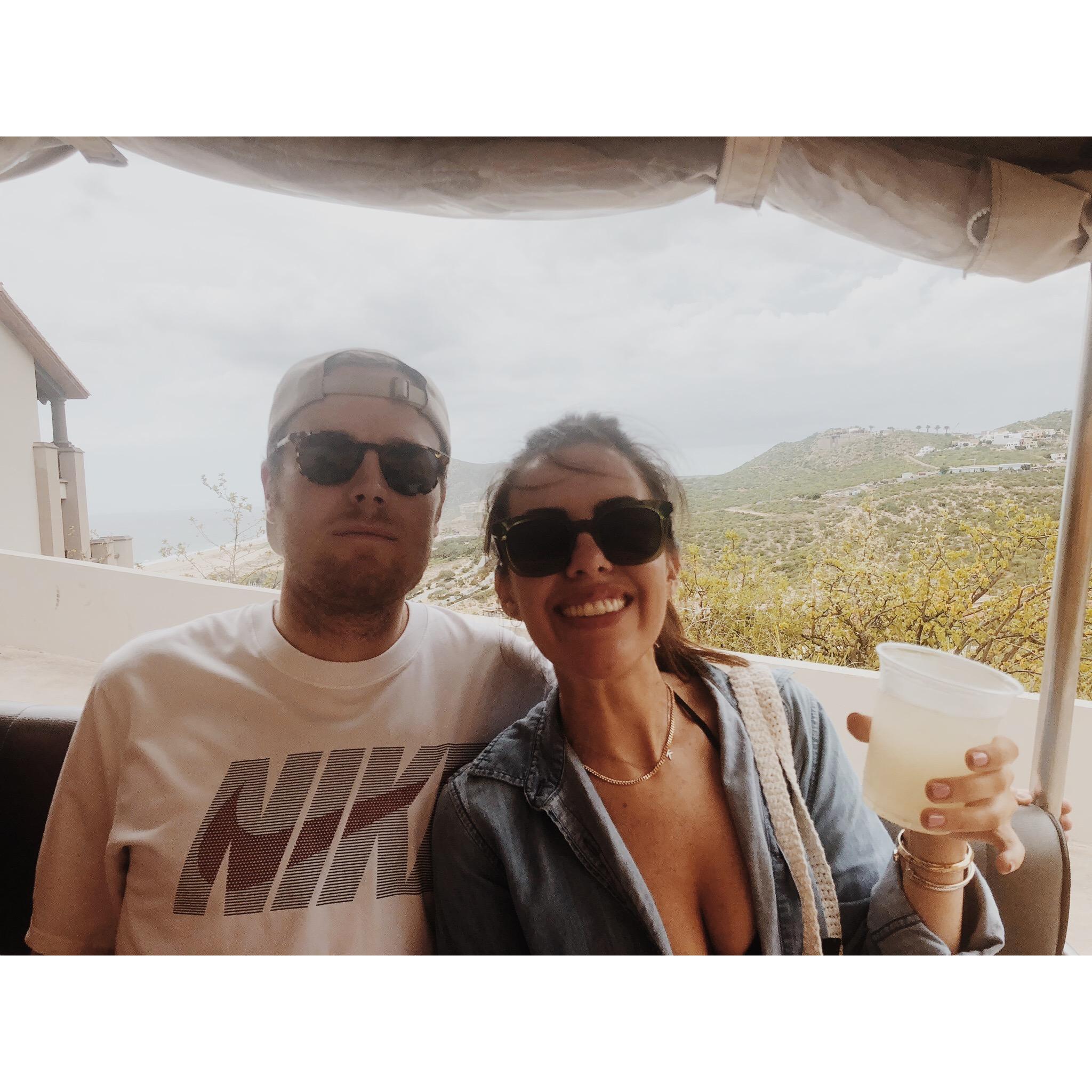 Cabo. On the golfcart to the hotel, drink in hand, ready to party!