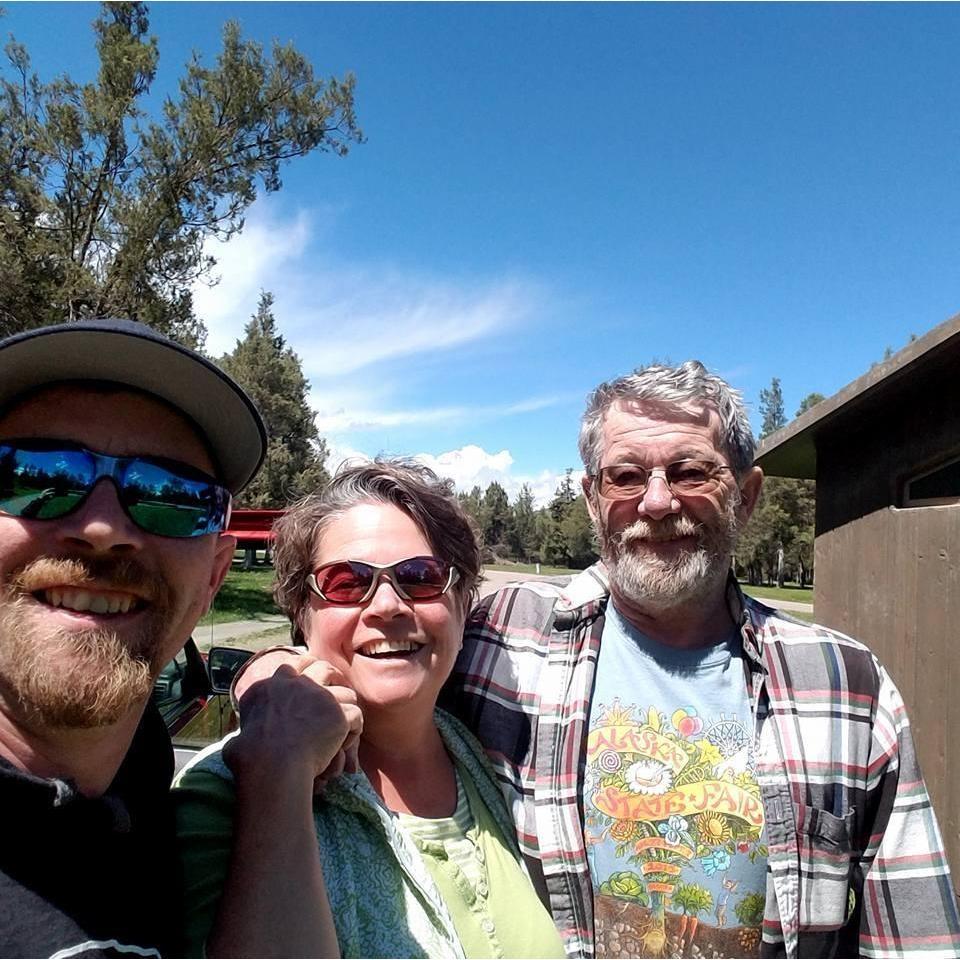 Tim, mom Mandy, and dad Tom.