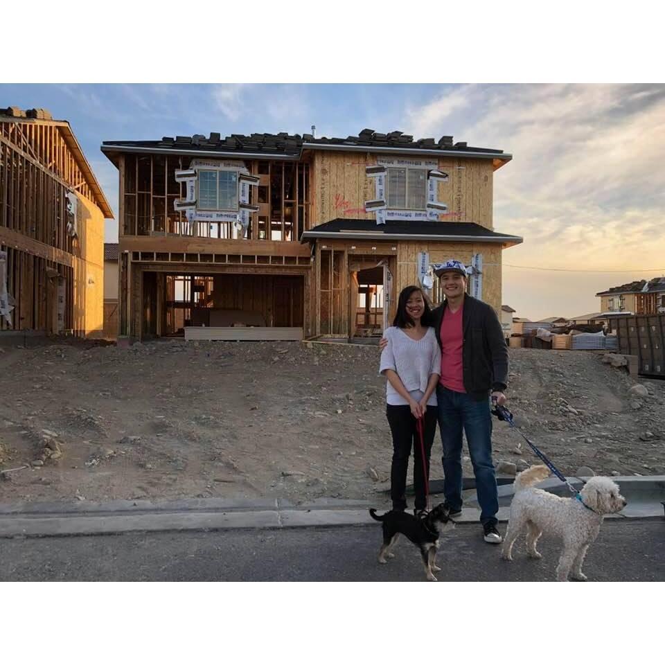 Standing in front of our new house.
