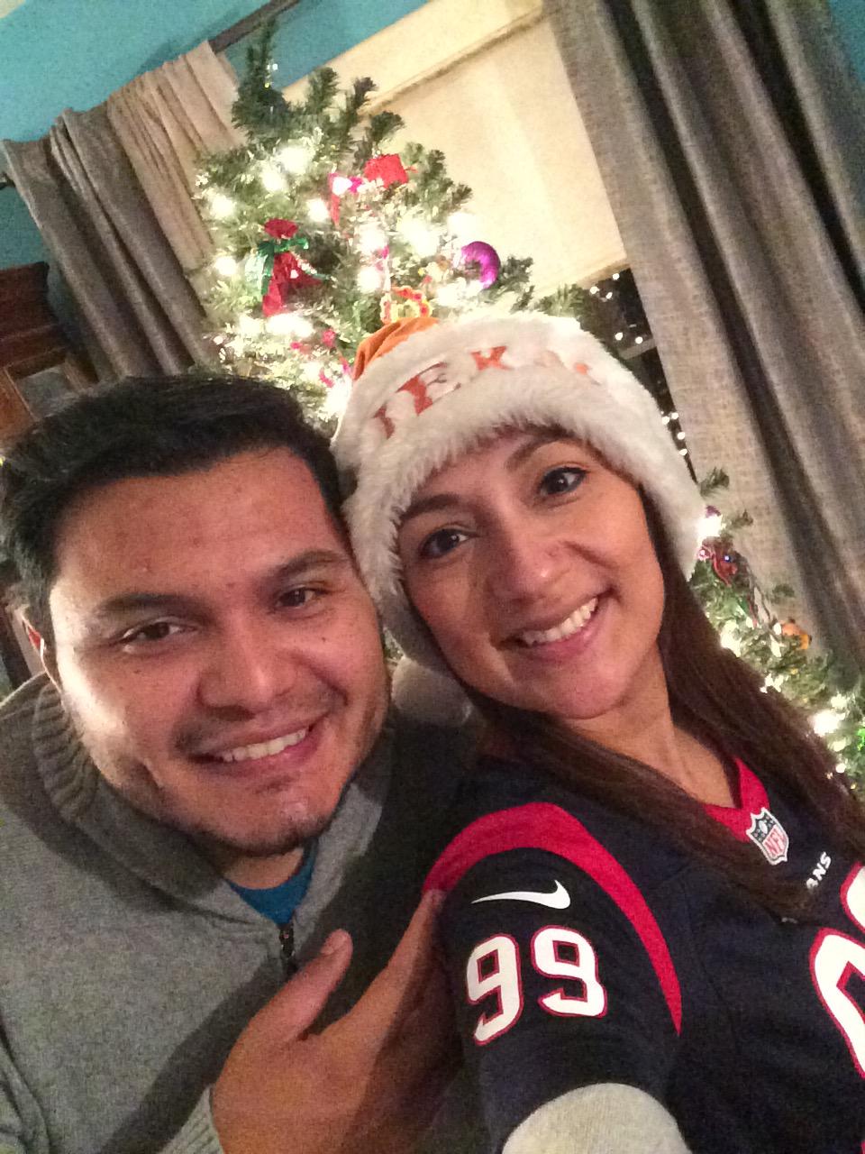 Our first Christmas together. Rockin' my new Texans jersey. Yyuh!