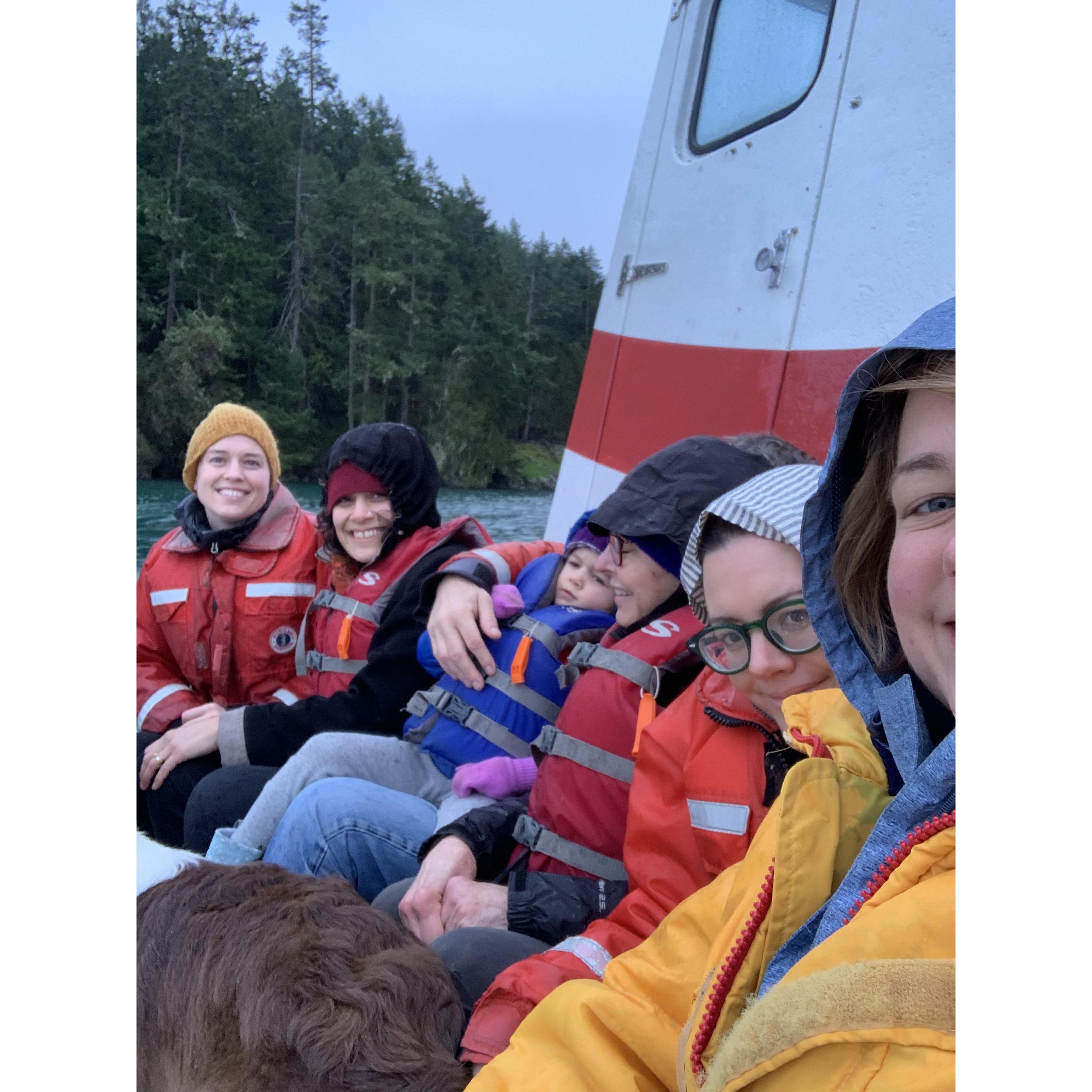 With Chelsea's family, and Sheila, on a rainy boat!