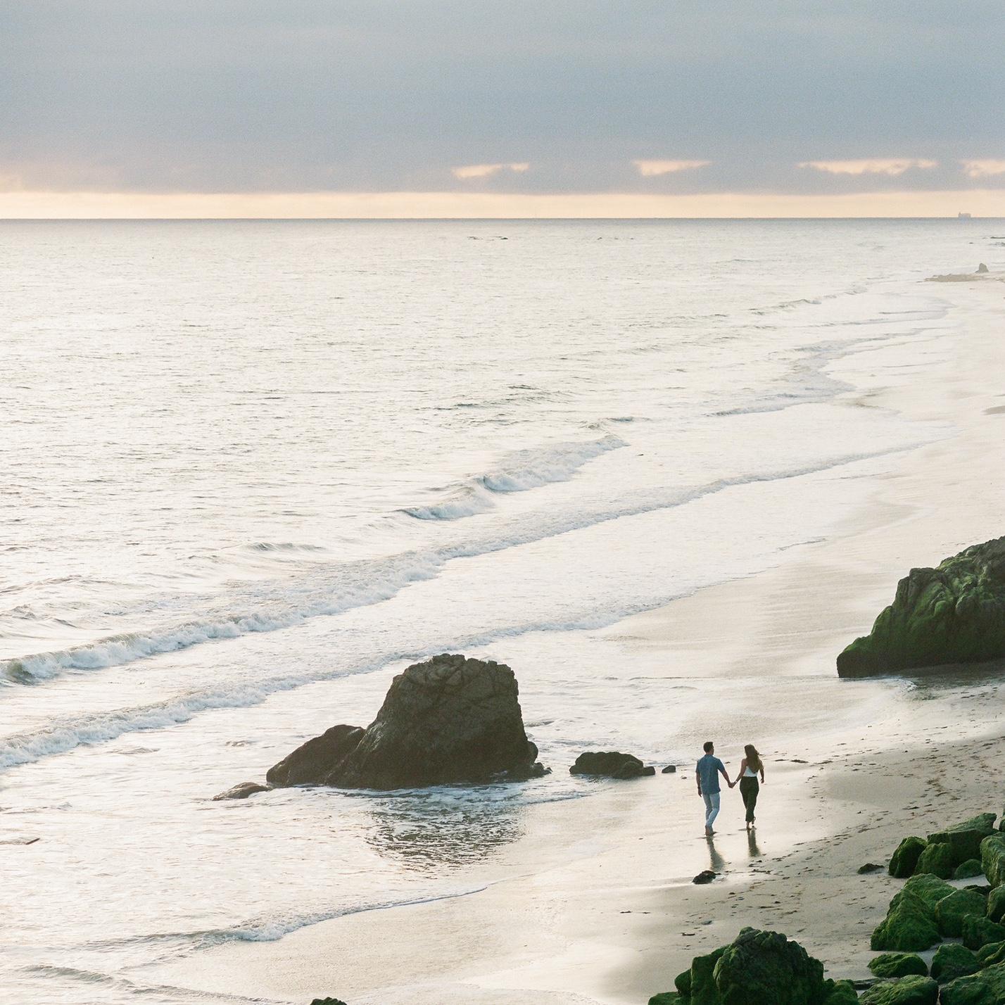 We took our engagement photos at an awesome beach in Malibu, CA.