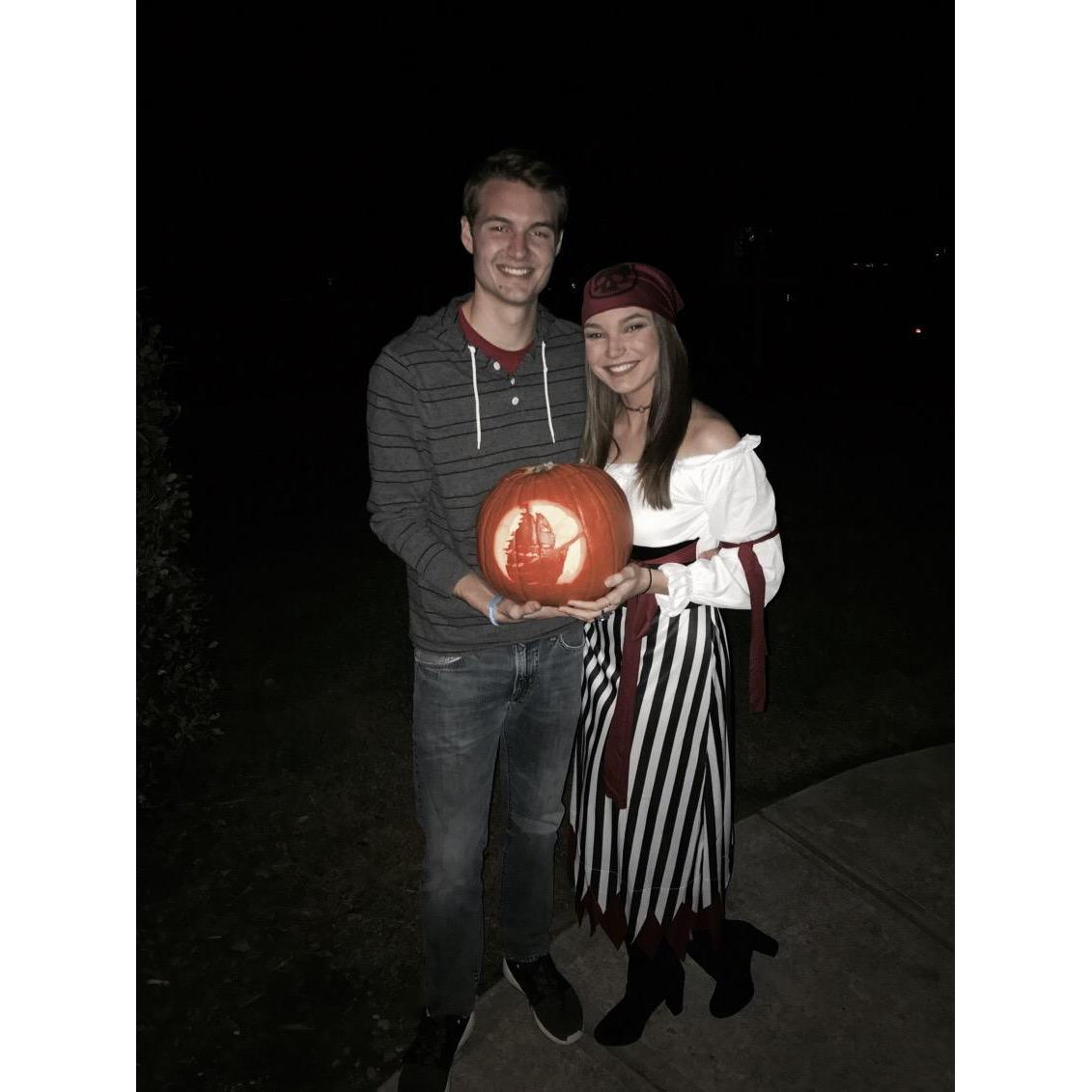 They carved their first pumpkin together on Halloween night! Olivia transformed from an 80's rocker into a pirate! Caleb dressed as himself.