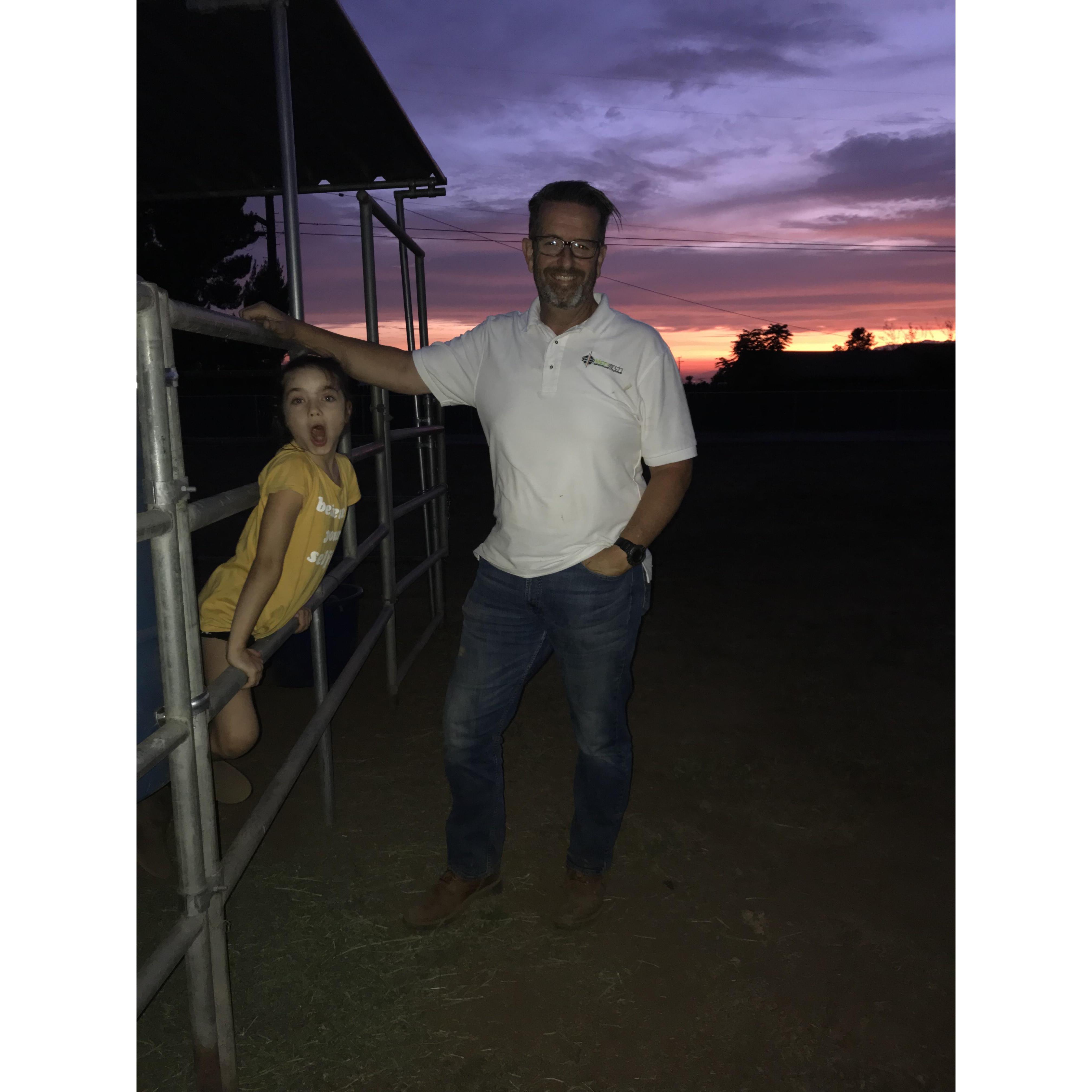 Rose and Brian near our corral and fabulous sunset in the background on my birthday.