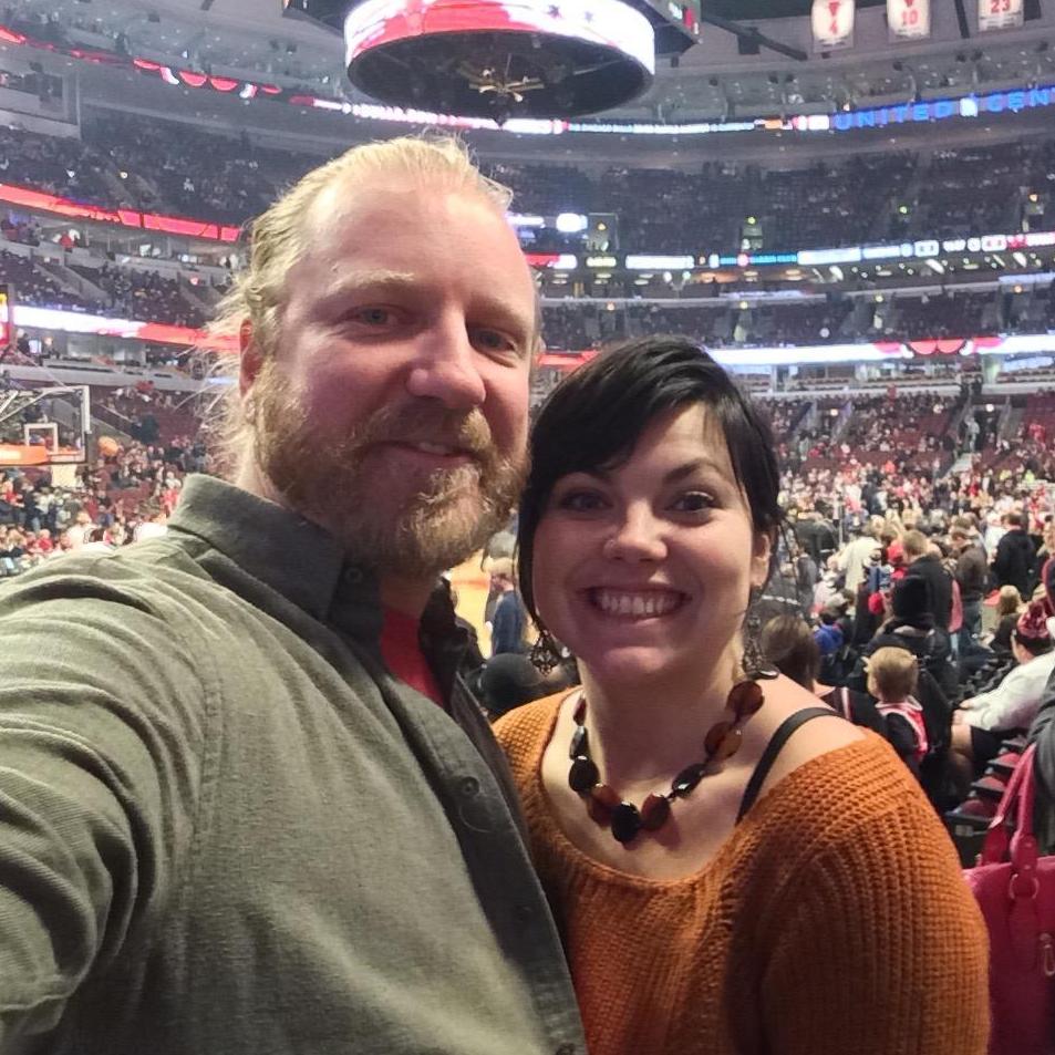After dating just a couple months, Ian suggested that Kim wear a Christmasy sweater to dinner, assuming she would wear red, and then he surprised her with 7th row seats to a Bulls Game! Dec. 6th 2014