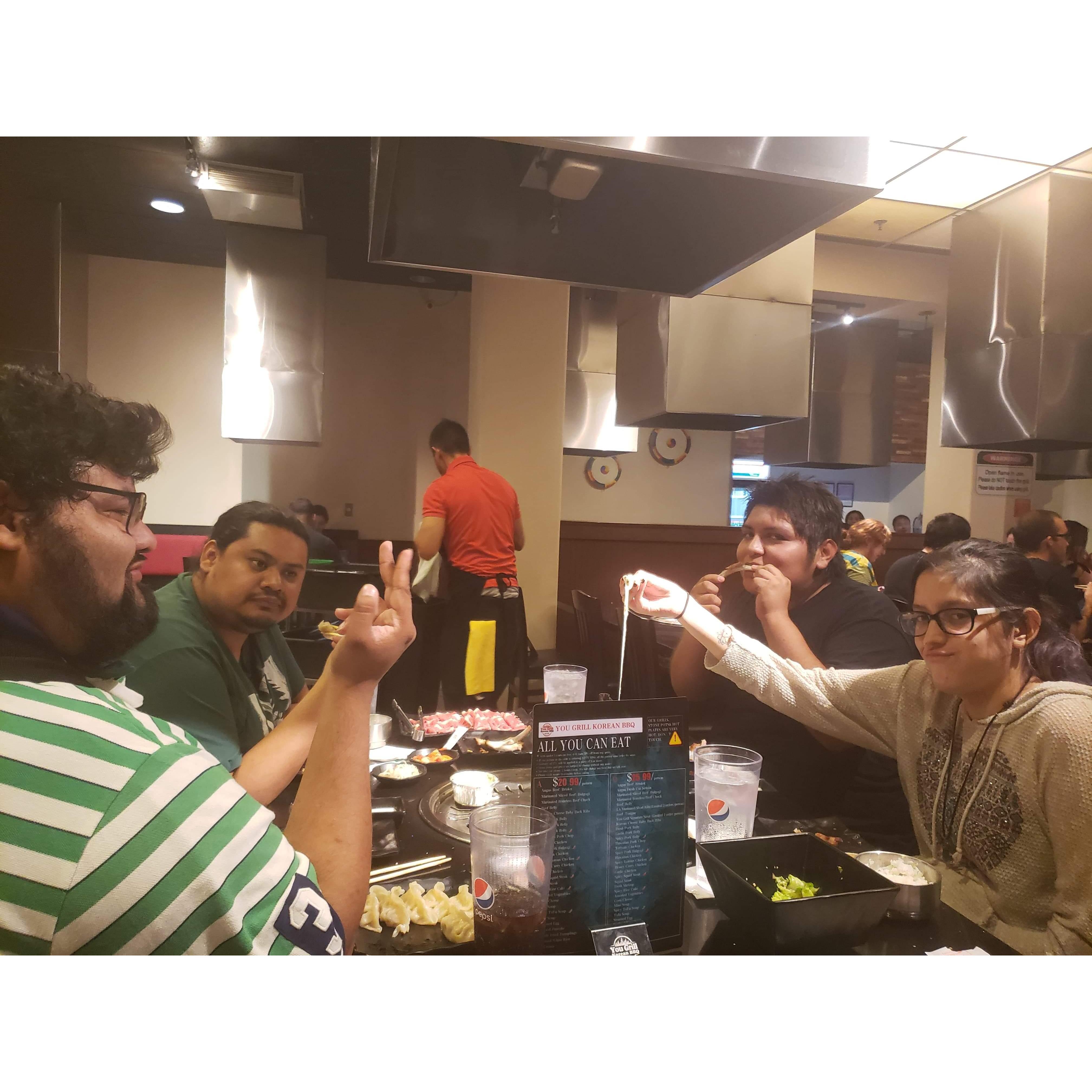 Us eating Korean BBQ. Look at that cheese.