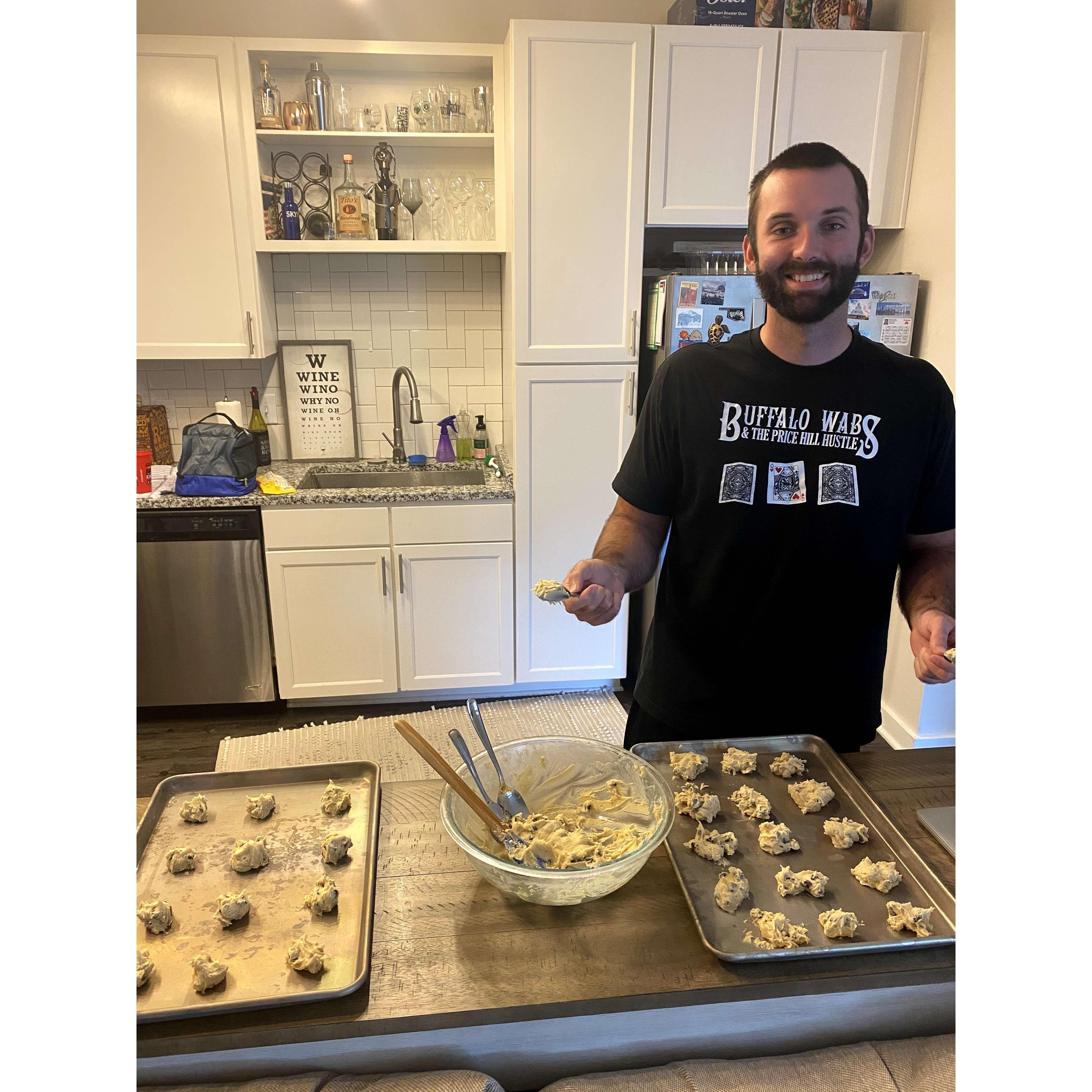 Teaching Russ how to make homemade chocolate chip cookies.