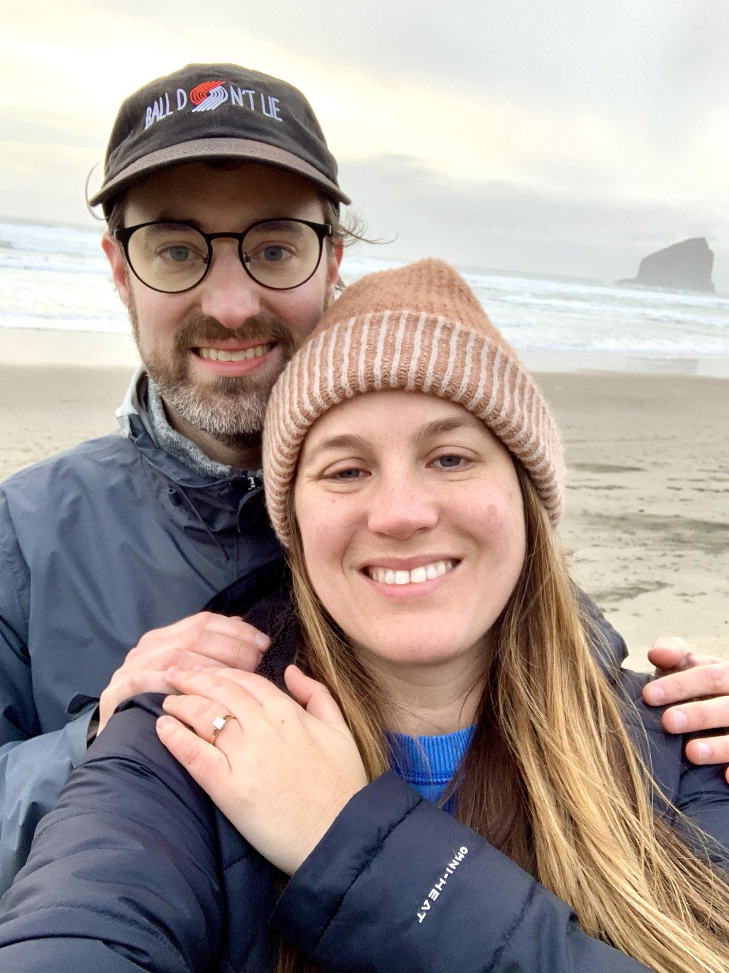 I said "YES"!! We were on a getaway at the Oregon coast. On New Year's Eve we went on a beach stroll at Cape Kiwanda and Michael popped the question. We welcomed the New Year as an engaged couple!