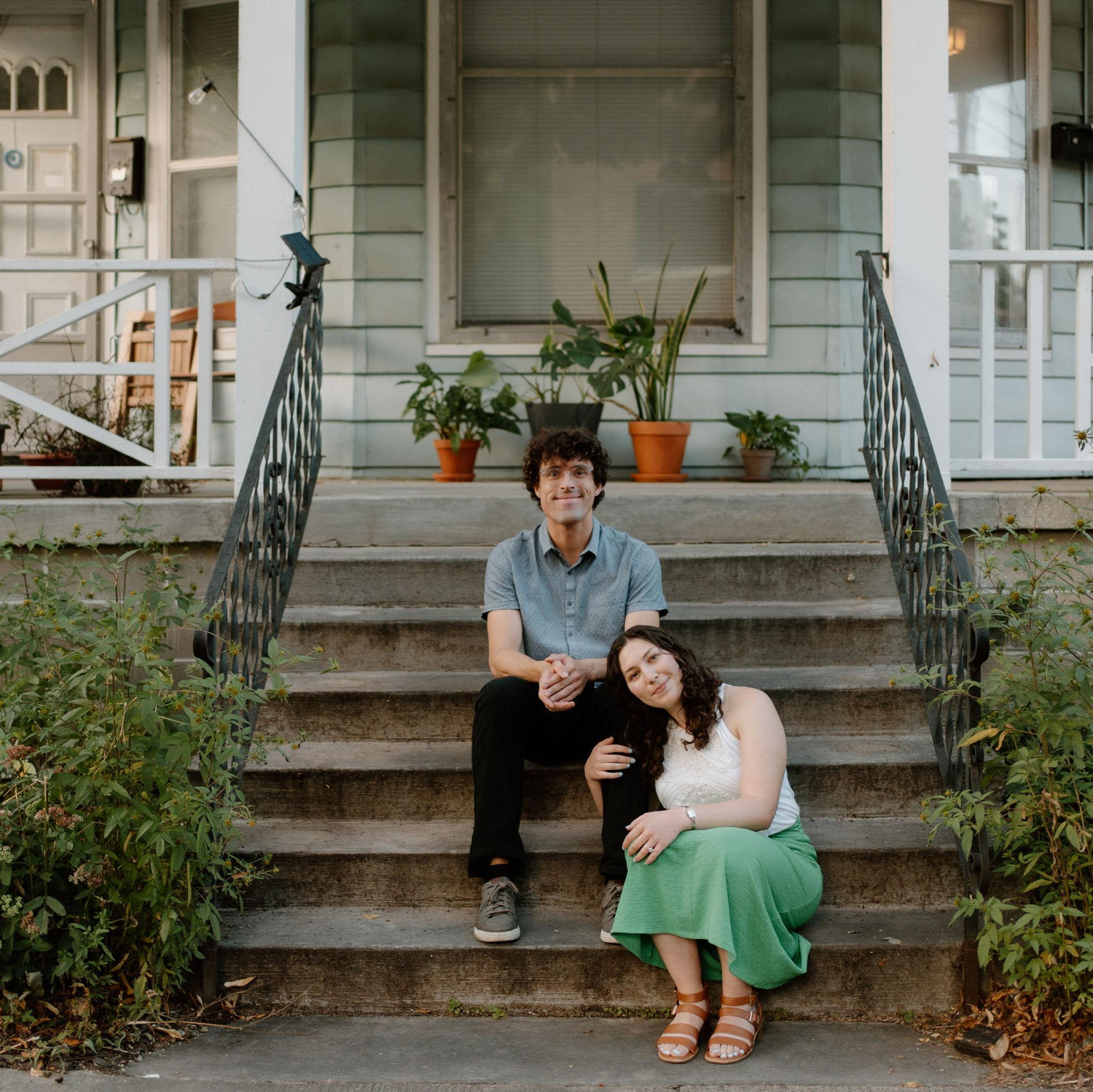 Here we are on the steps in front of the house we've lived in since April 2023, patiently waiting for you (yes, you!) to get to Madison to celebrate with us.
