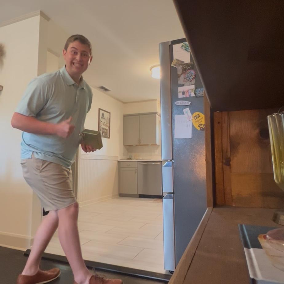 A screen shot of the hidden camera from the proposal! Ryan proposed in the middle of our kitchen with just us and the pups!