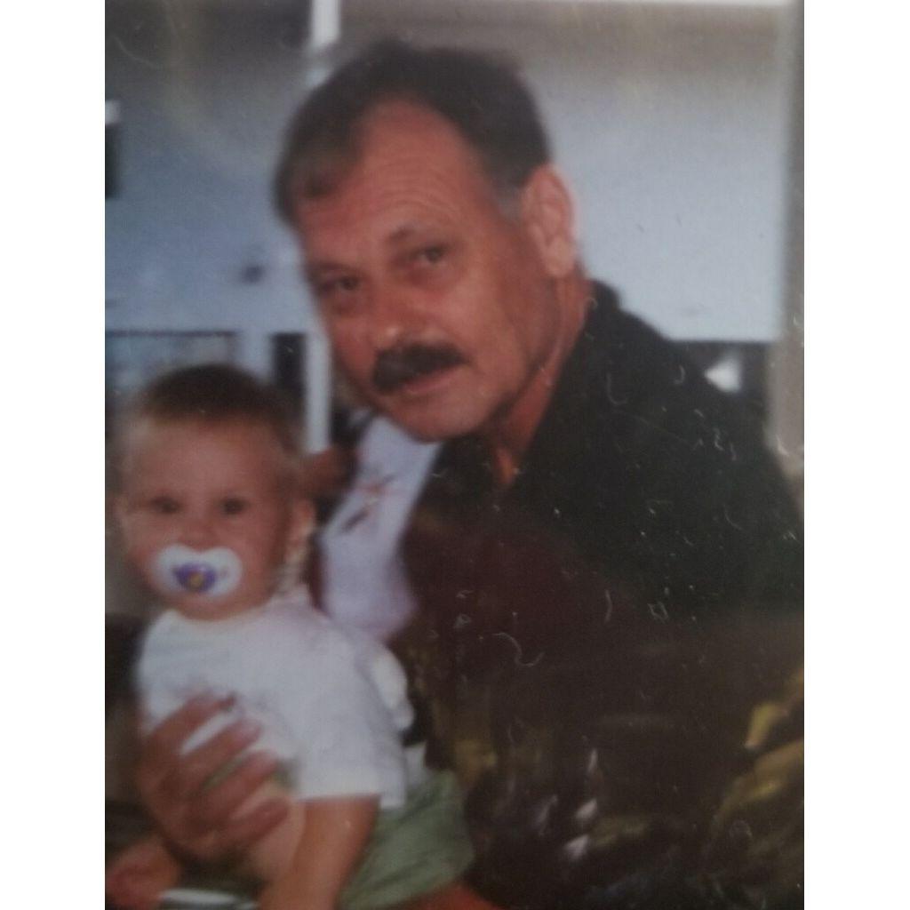 Baby Nick and his late father Larry.