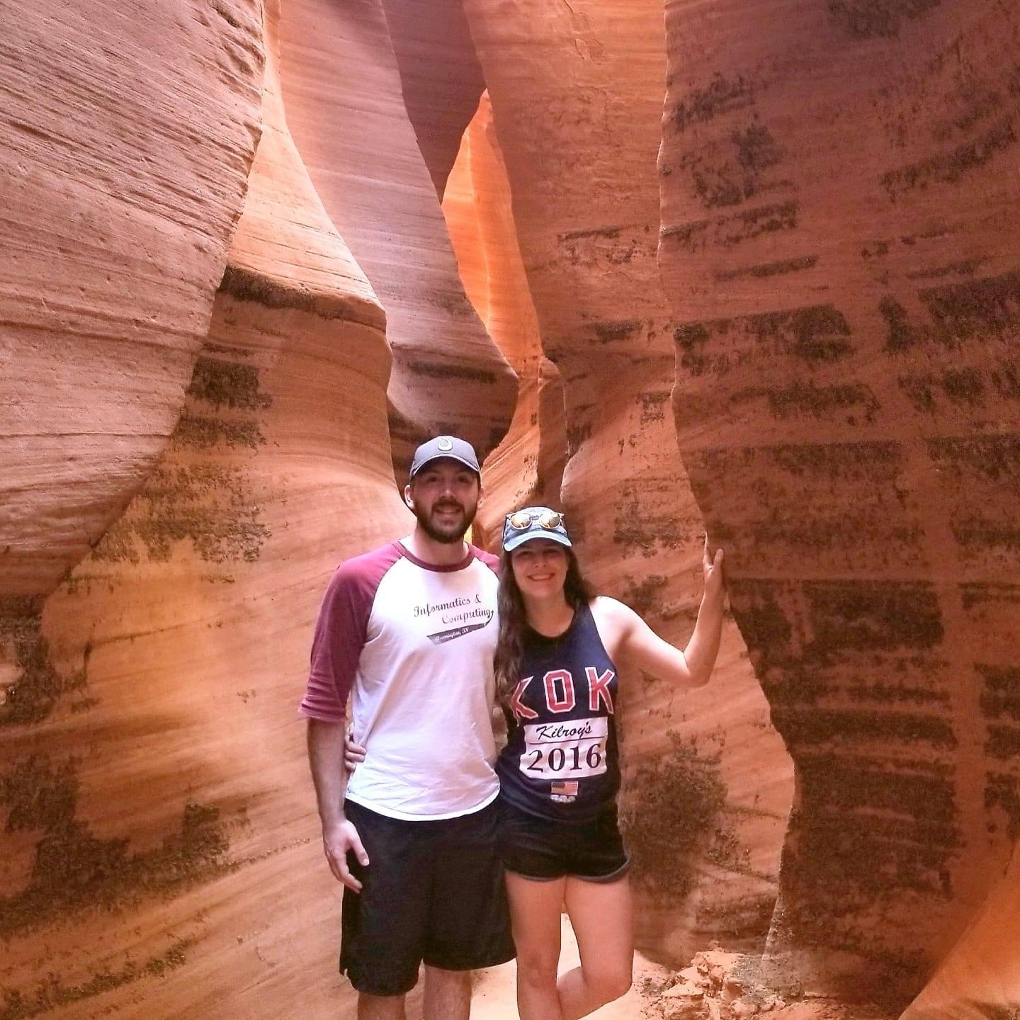 Adam and Danika in a slot canyon in Utah.
