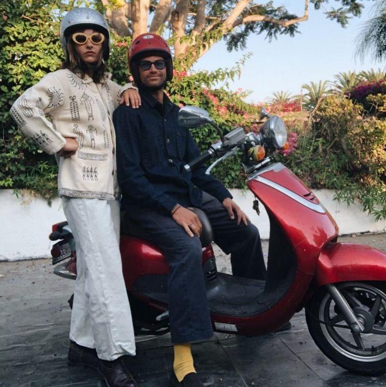 We used to rip this red moped all over town. Pictured here on a hot date in our driveway in Summerland
