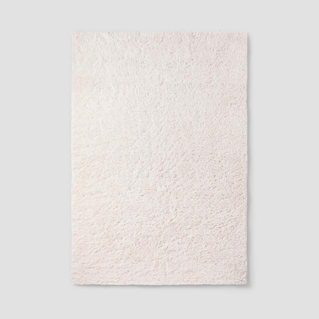 7'X10' Plush Shag Washable Area Rug Cream - Room Essentials™