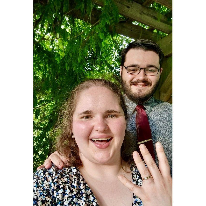 Shortly after we got engaged and Maggie actually stopped dancing long enough to take a picture.