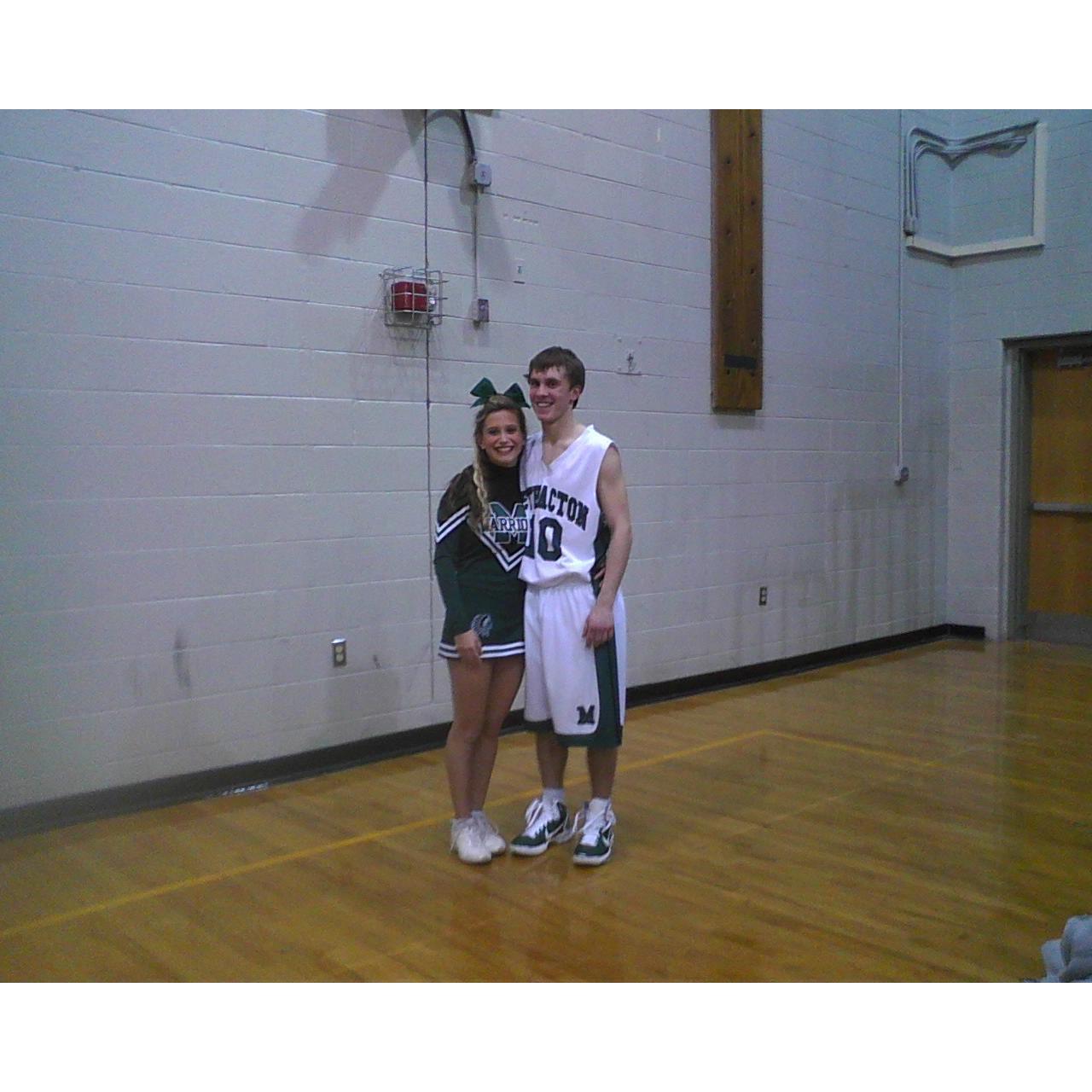 Alix cheering for Matt at a Varisty Basketball game.