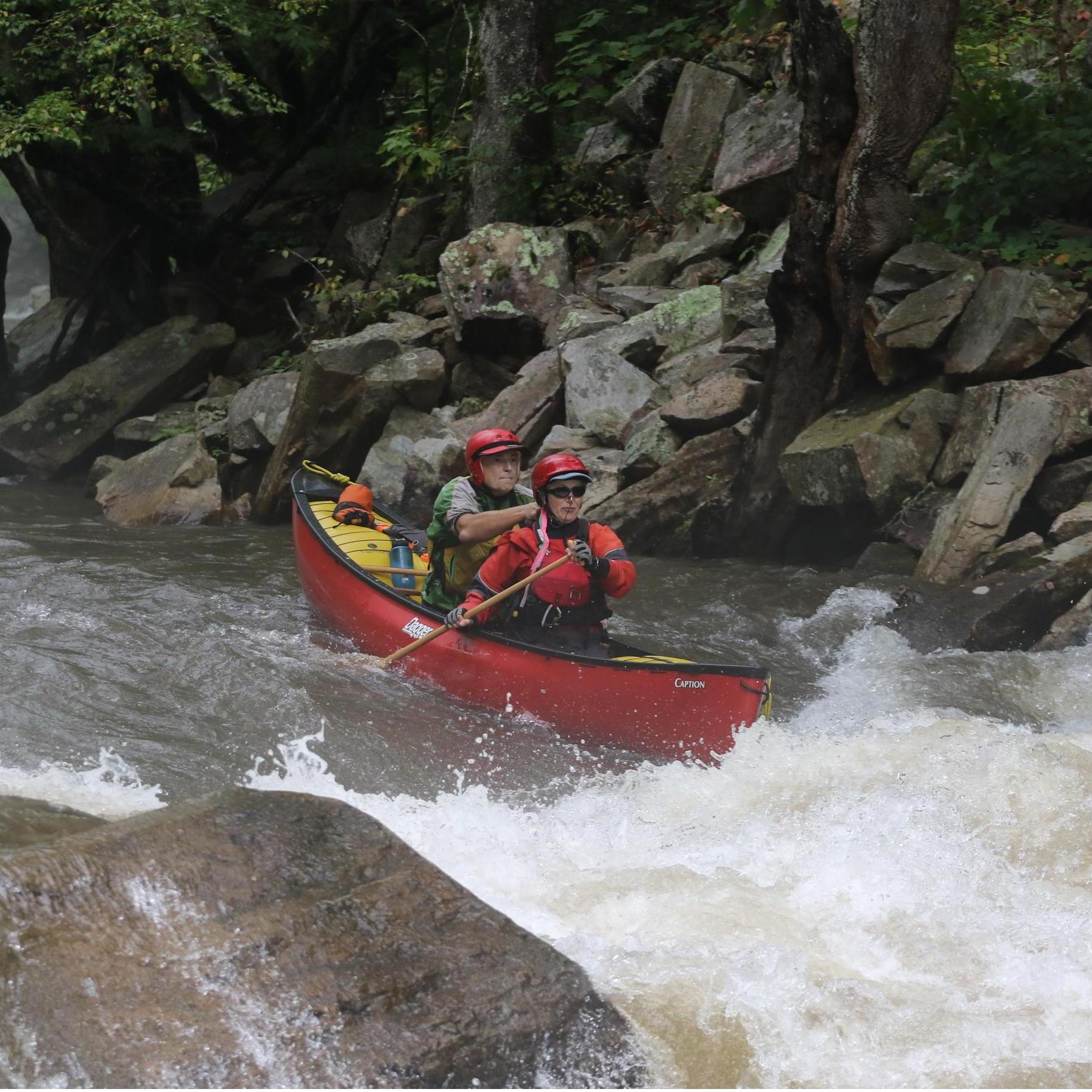 Our first run at the Nantahala Falls in a tandem canoe - definitely not a "divorce boat" for us!