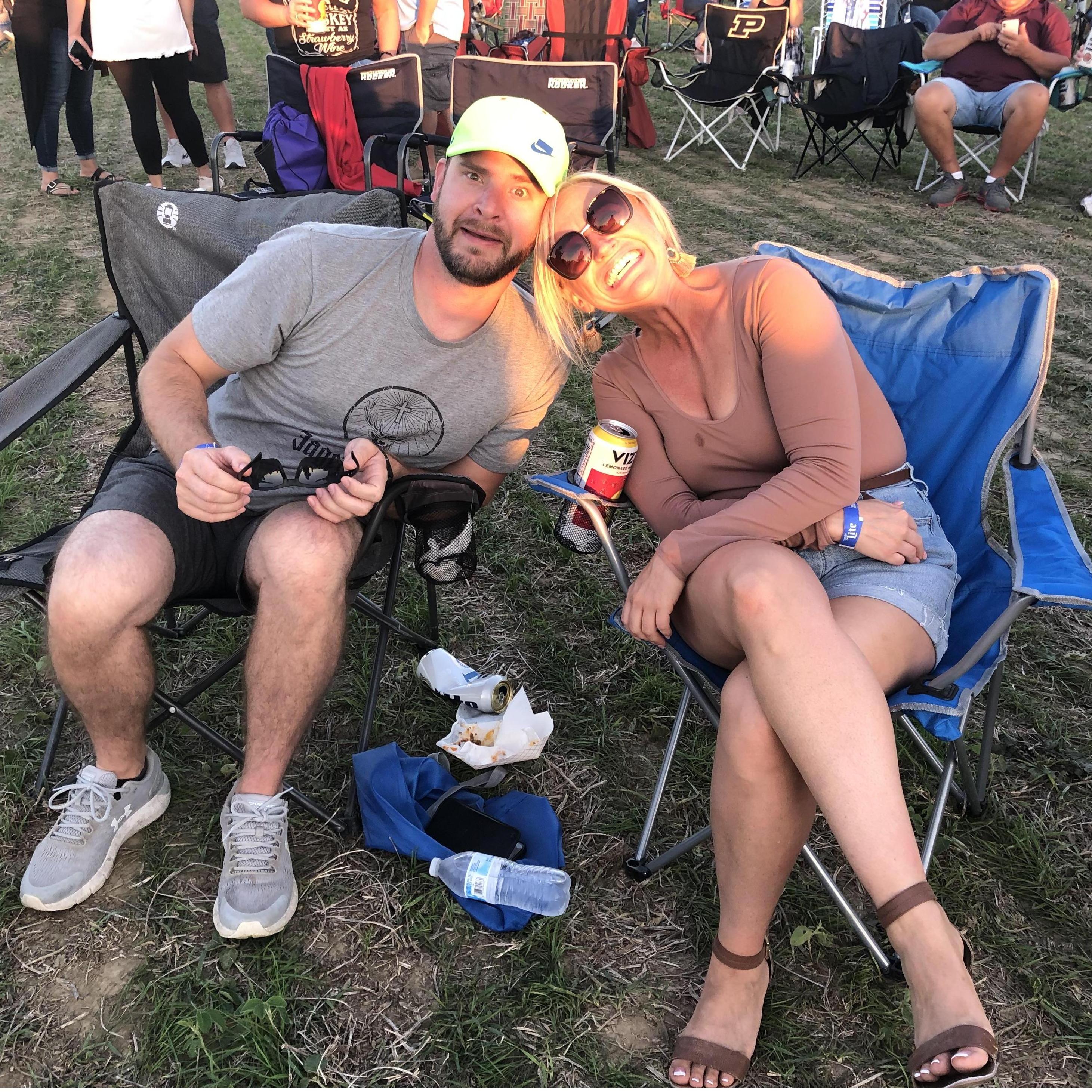 All smiles during the Luke Bryant concert. Laurie is NOT a country music fan but her man is. She'll just have to learn.