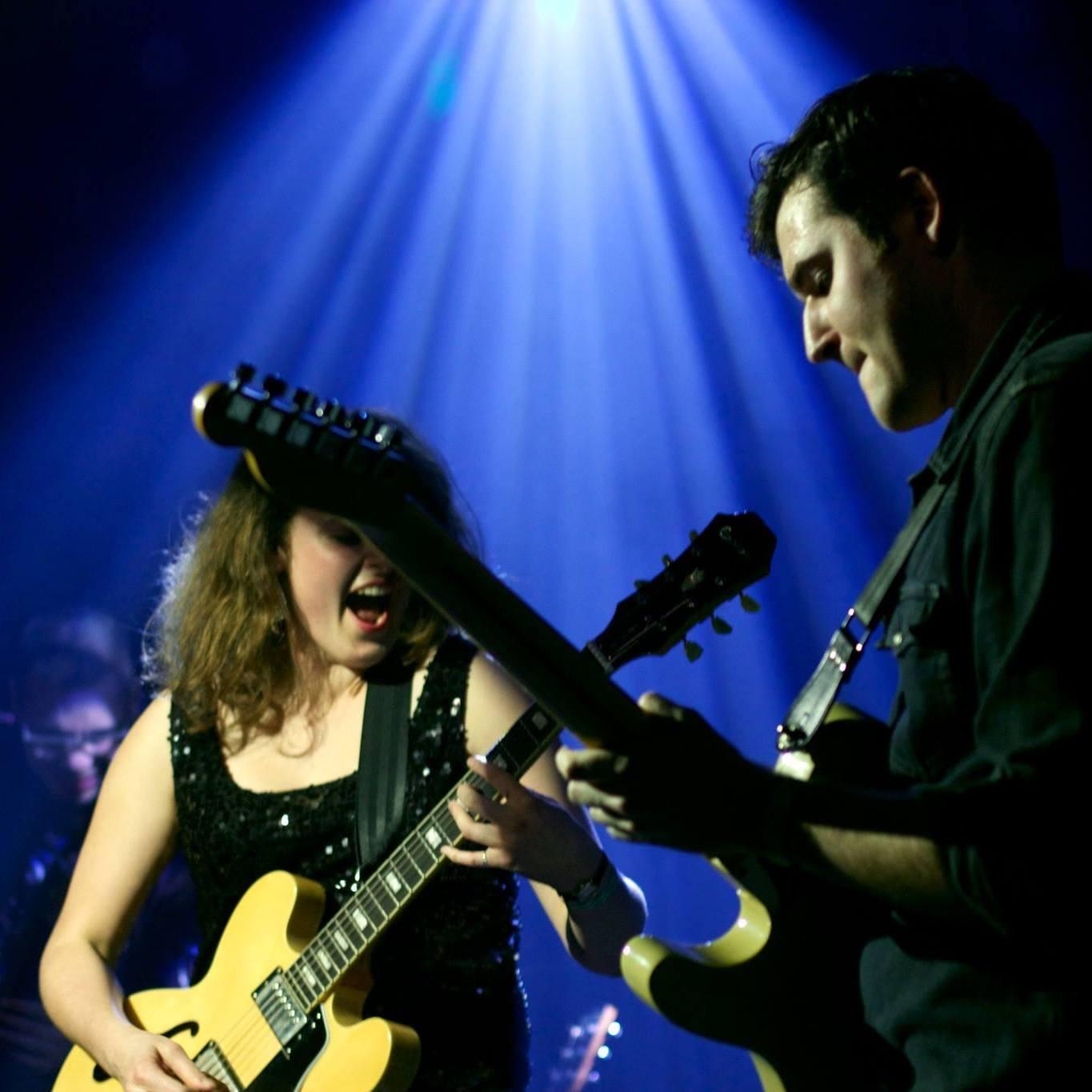 We had to throw in a few pics of playing music together...we spent a lot of time on loading docks and stages together! 