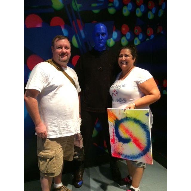 Having a picture taken with a blue man that spit me a painting...gross!